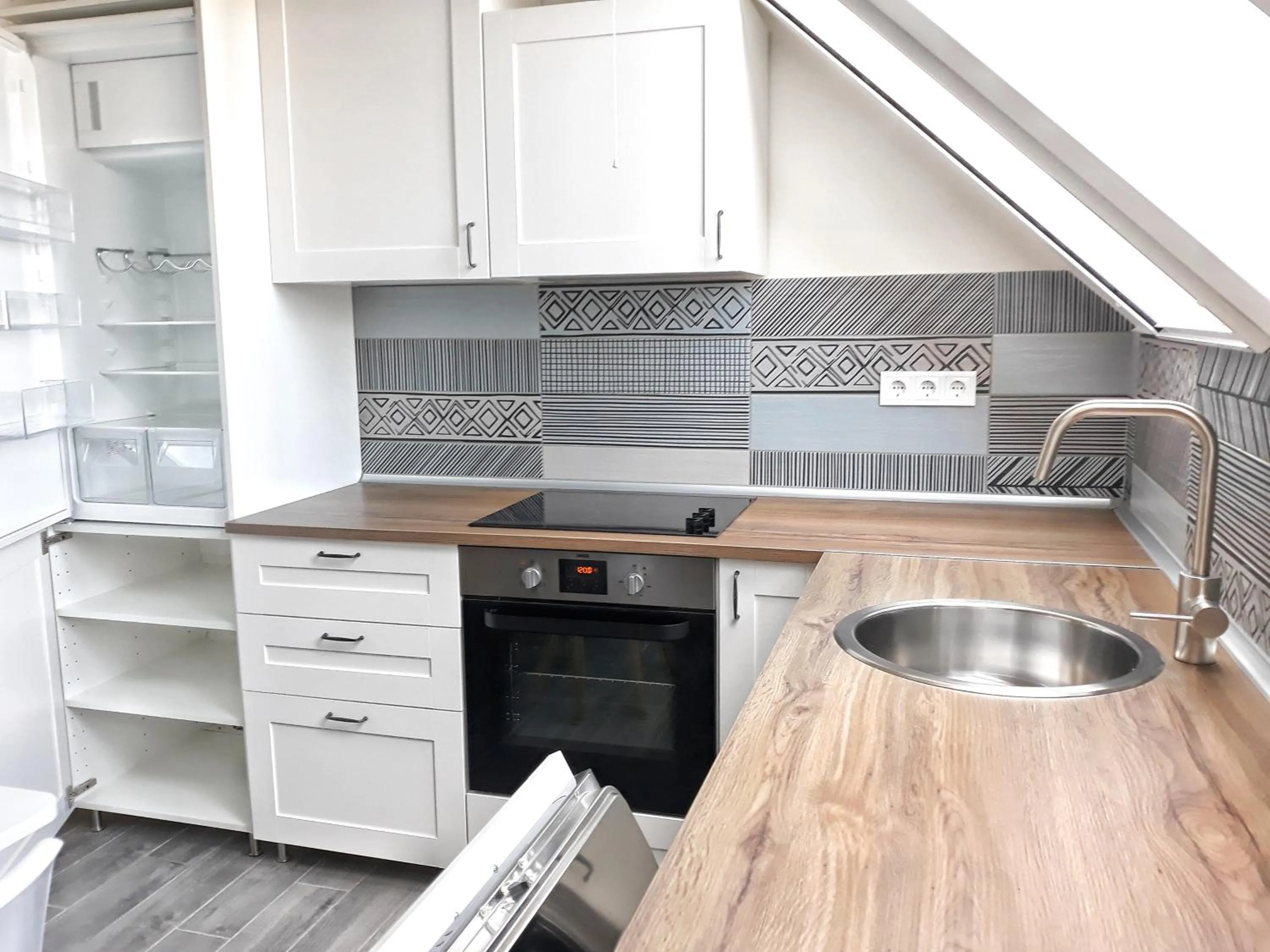 Kitchen or kitchenette in Cosy Holiday Apartment Keszthely