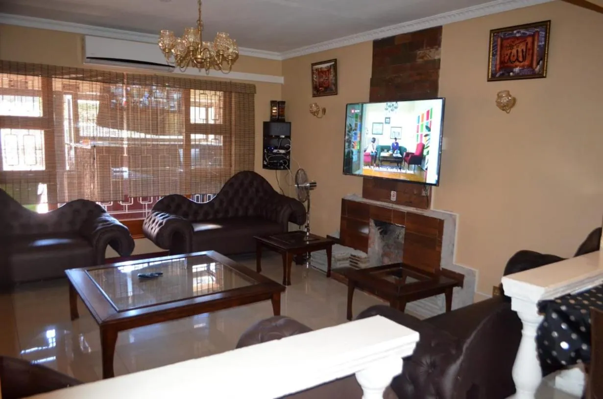 Communal lounge/ TV room in ST@Y-1-BnB