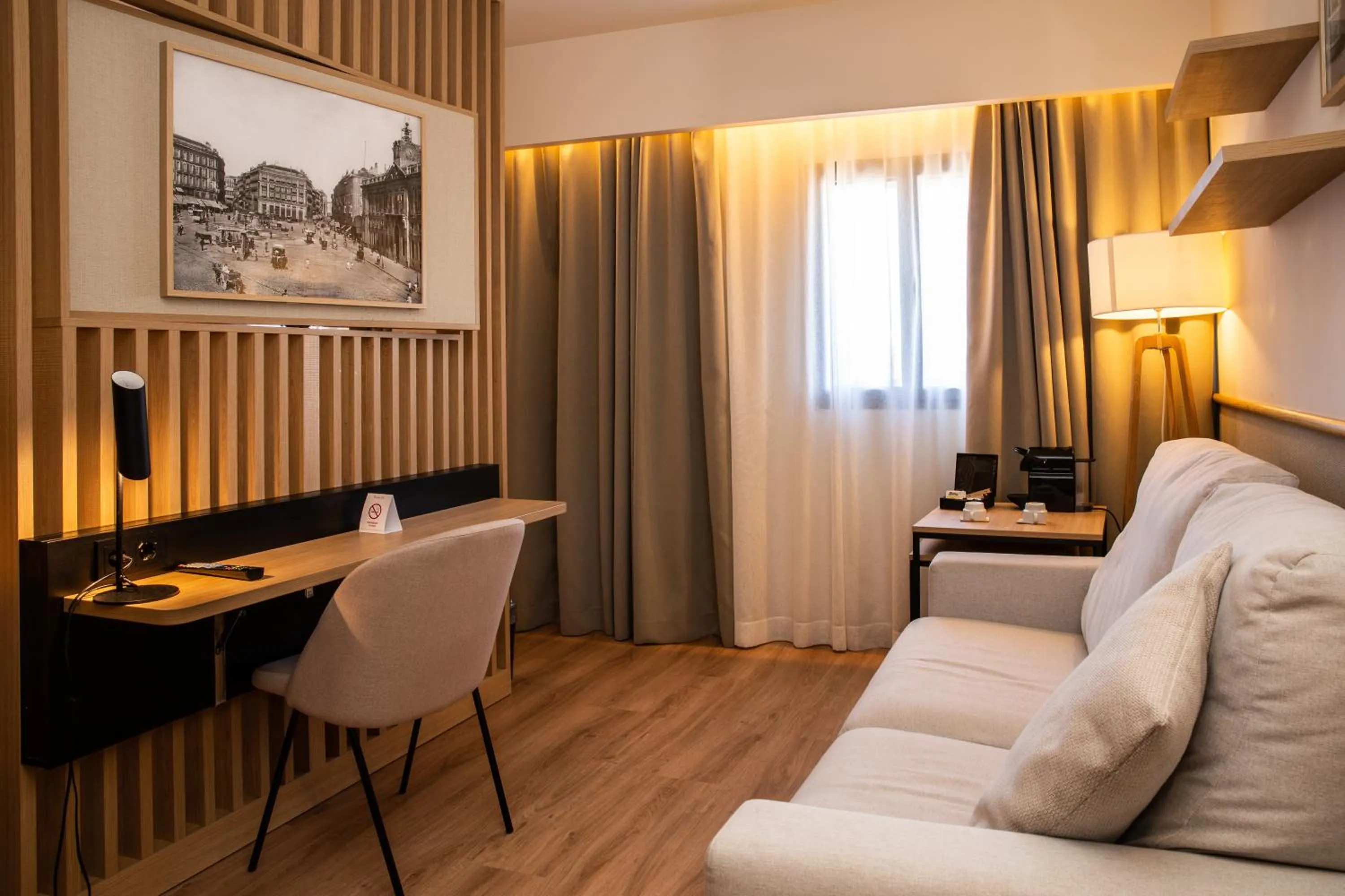 Living room in Ramada by Wyndham Madrid Getafe
