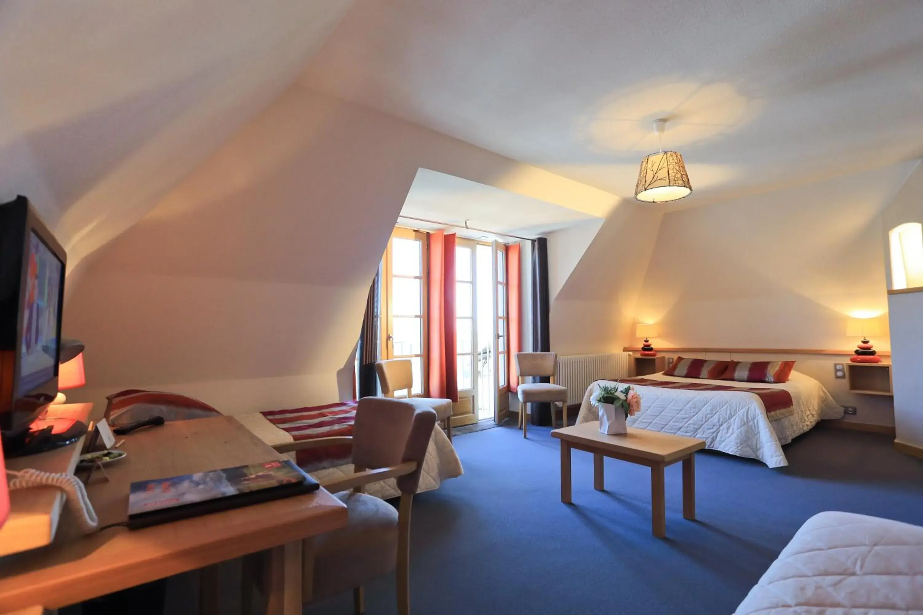 Family Room (4 Adults) in Logis Hôtel Restaurant & Spa les Remparts Family Room (4 Adults) in Logis Hôtel Restaurant & Spa les Remparts
