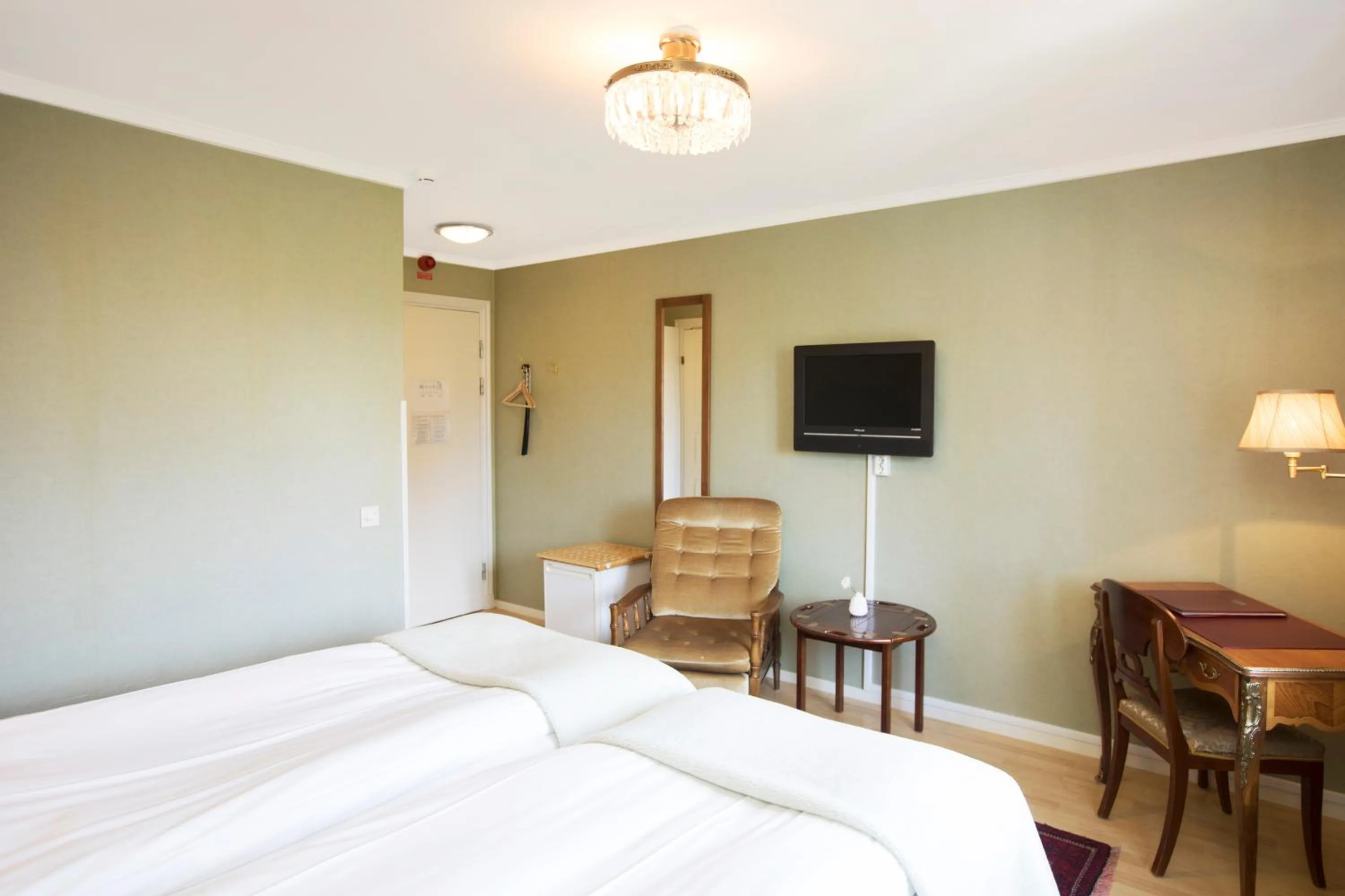 Photo of the whole room, Bed in Hotell Lindgården