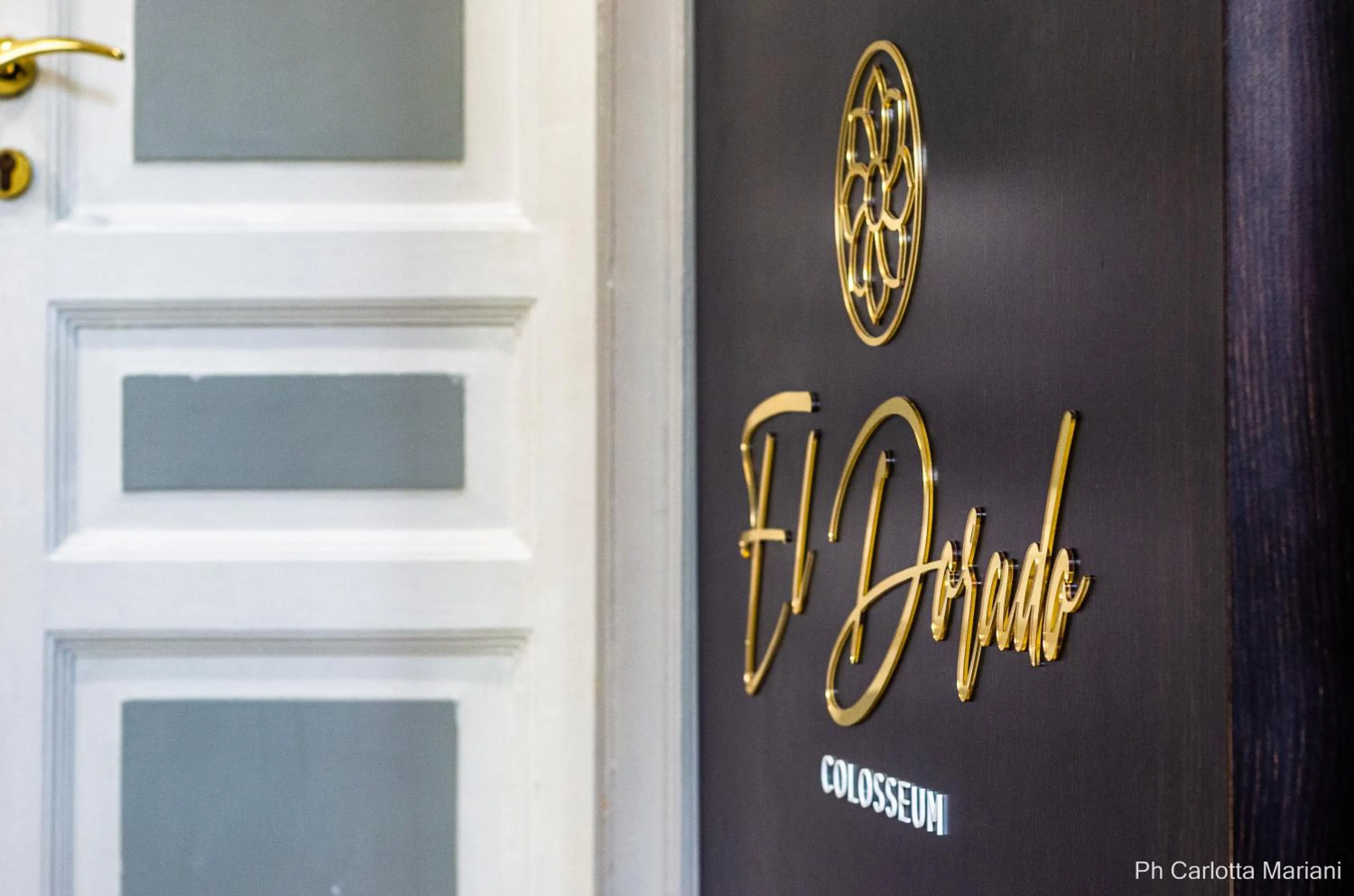 Property logo or sign in El Dorado Colosseum