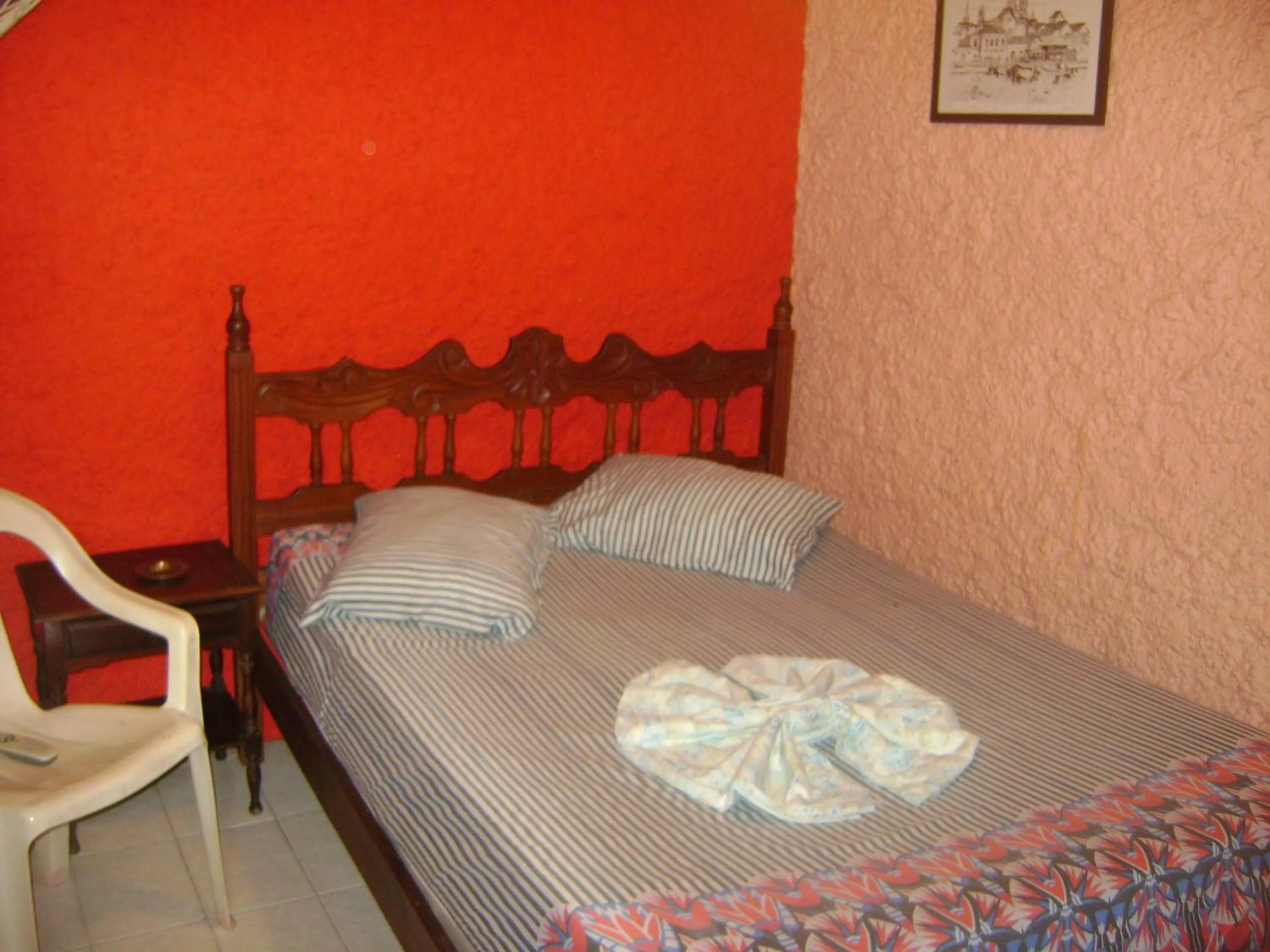 Bed in Hospedaria Nossa Senhora da Glória