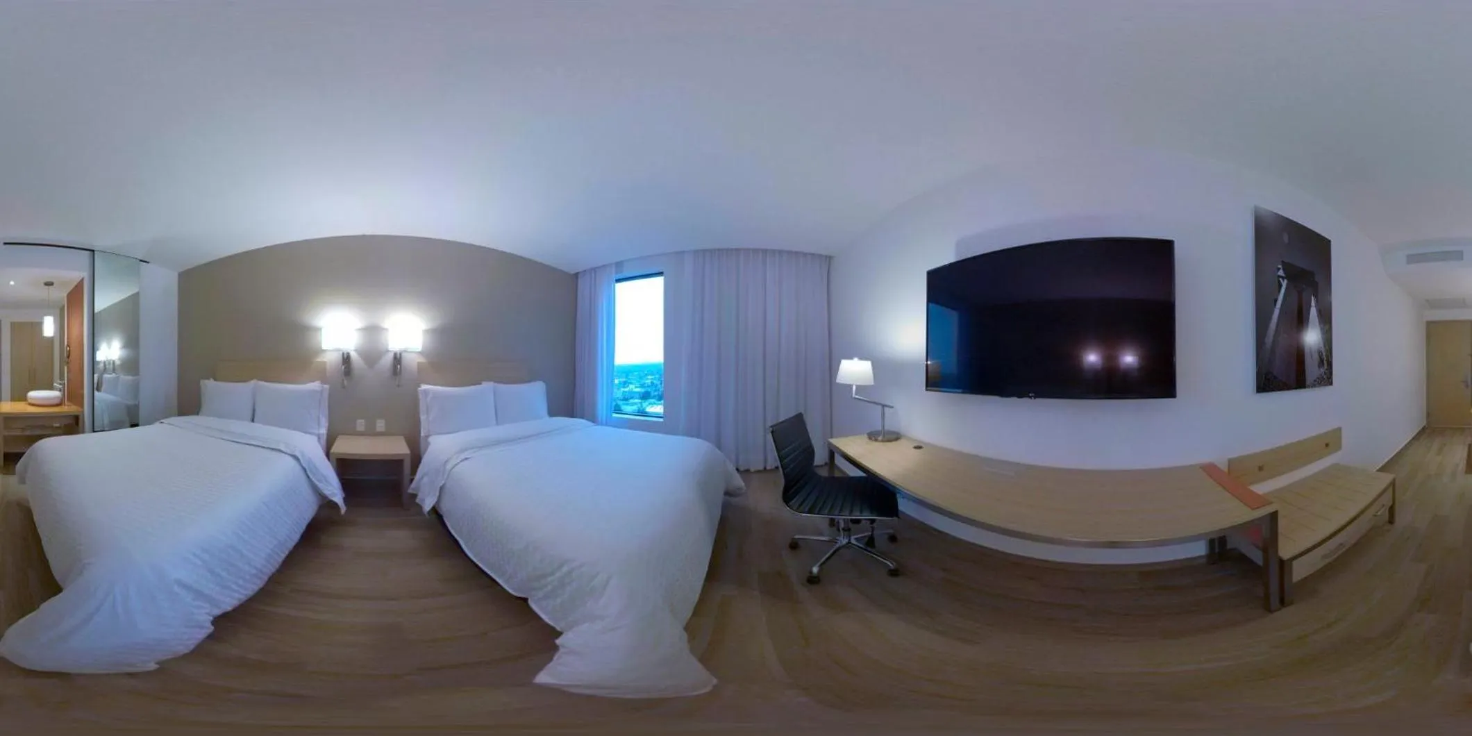 Photo of the whole room, Bed in Fiesta Inn Parque Puebla