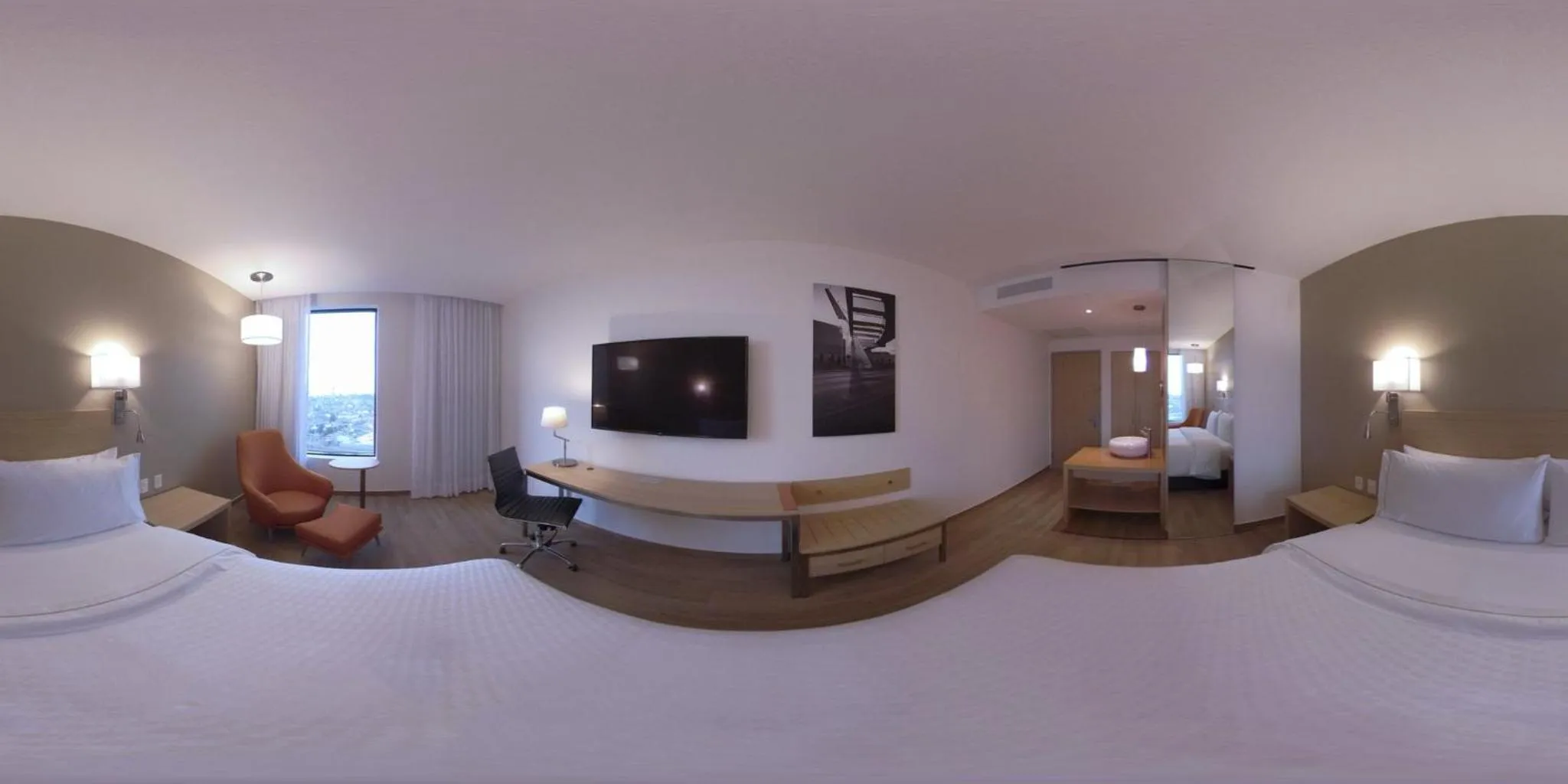 Photo of the whole room, Bed in Fiesta Inn Parque Puebla