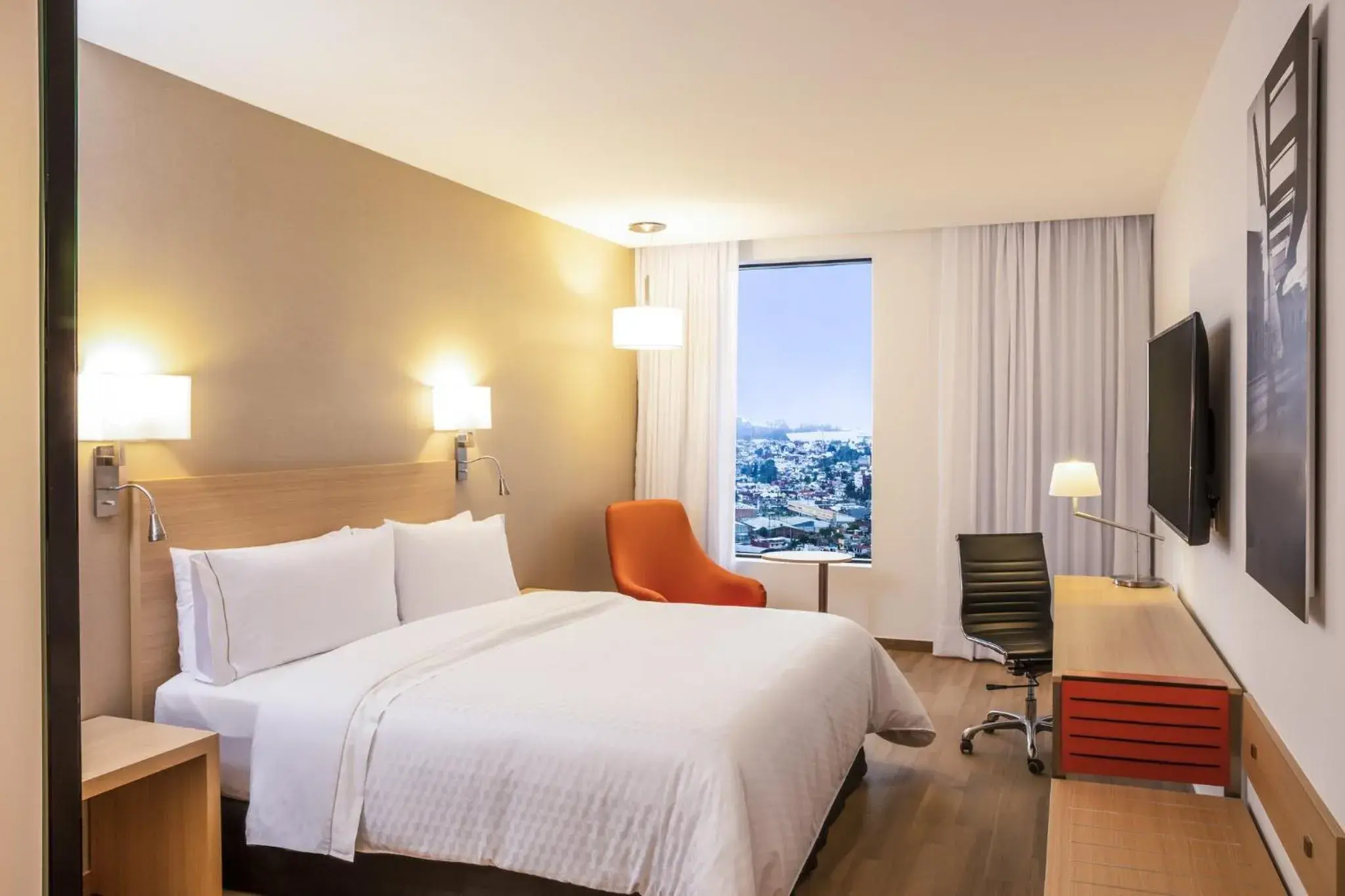 Photo of the whole room, Bed in Fiesta Inn Parque Puebla Photo of the whole room, Bed in Fiesta Inn Parque Puebla