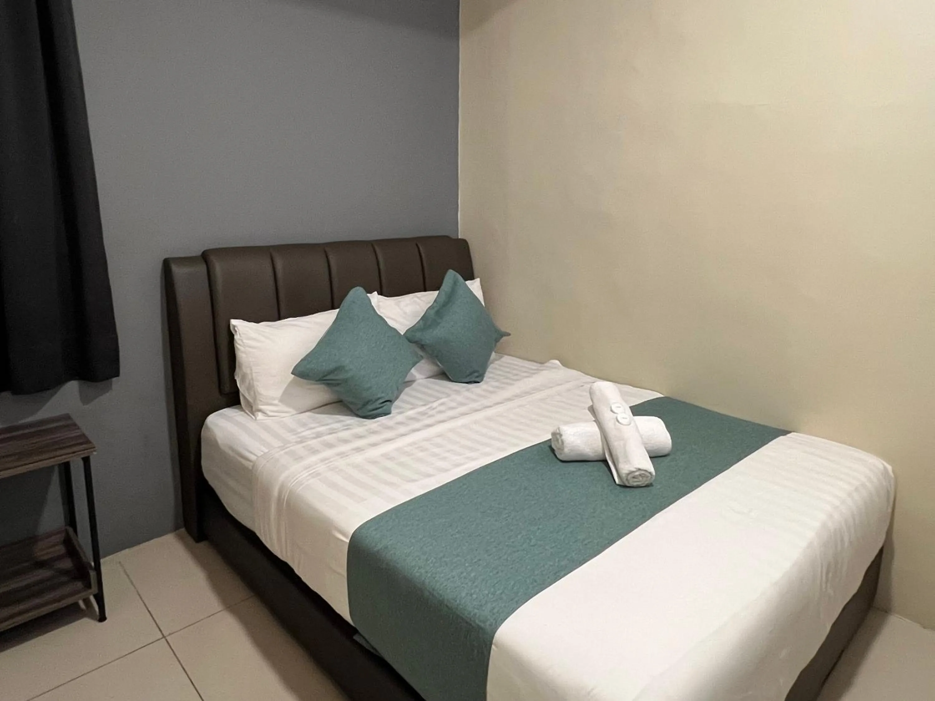 Bed in KUANTAN BESERAH BUDGET HOTEL