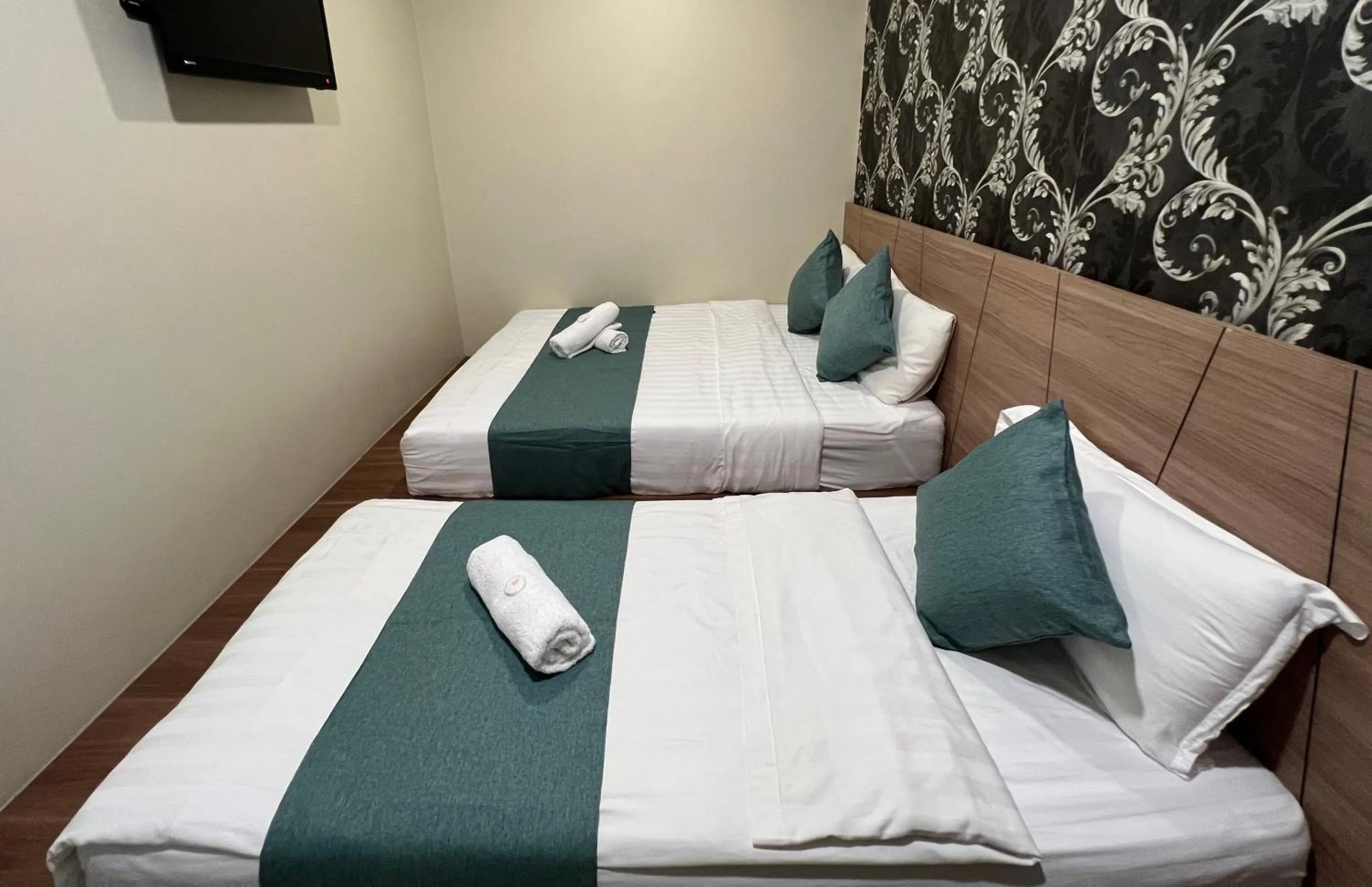 Bed in KUANTAN BESERAH BUDGET HOTEL