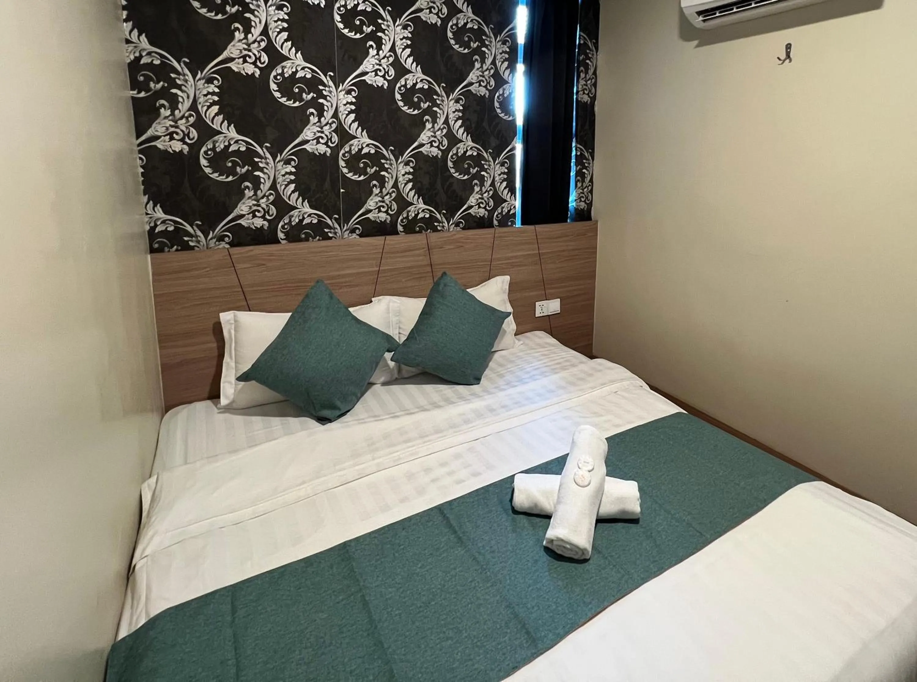 Bed in KUANTAN BESERAH BUDGET HOTEL