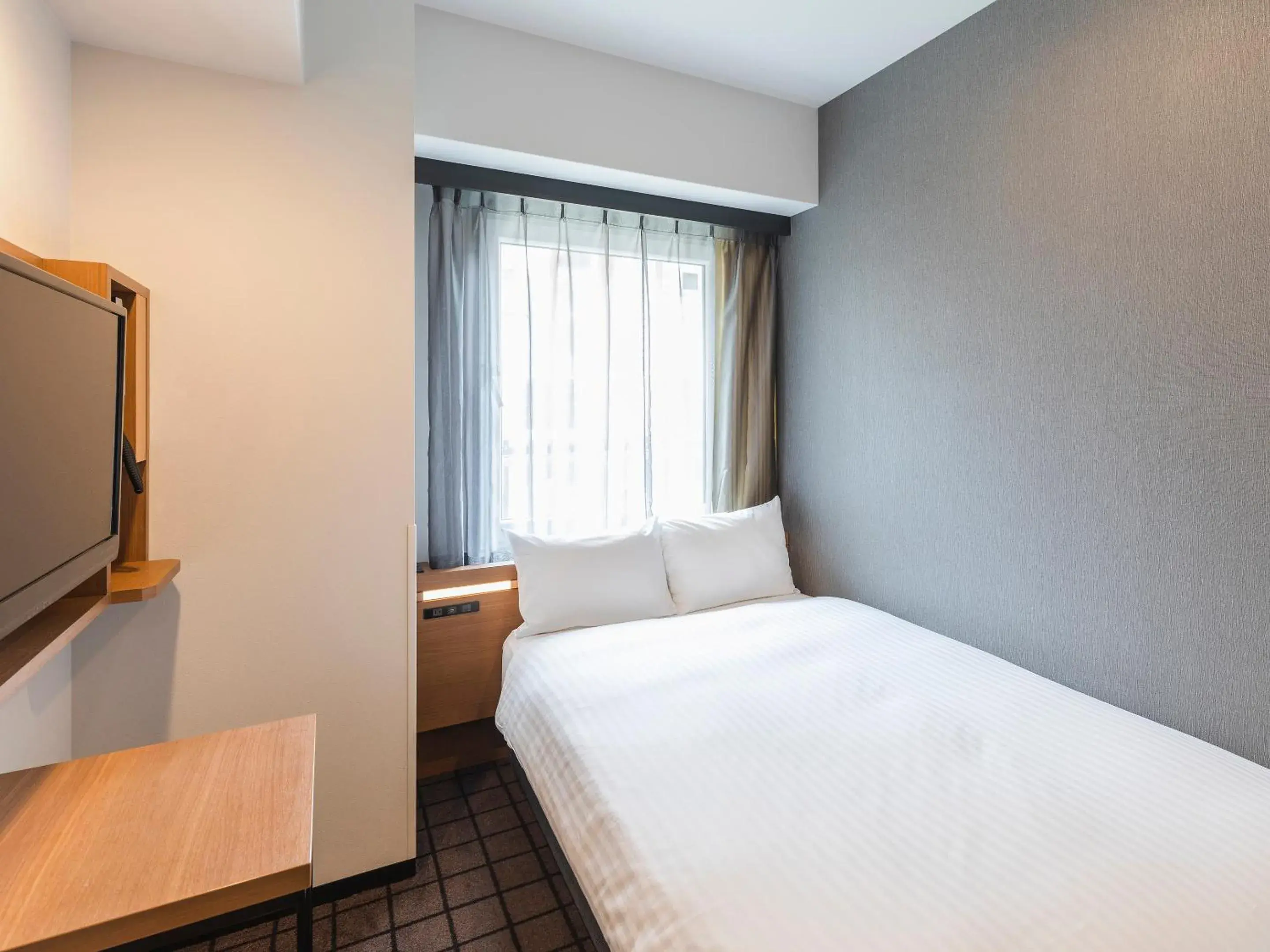 Photo of the whole room, Bed in Sotetsu Fresa Inn Kobe Sannomiya Photo of the whole room, Bed in Sotetsu Fresa Inn Kobe Sannomiya