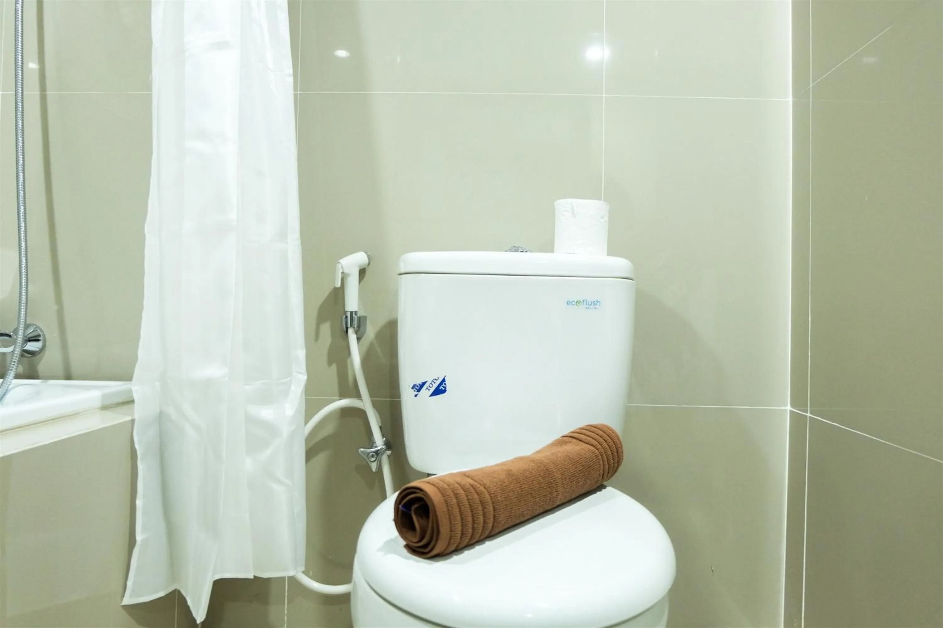 Studio Room Azalea Suites Apartment By Travelio