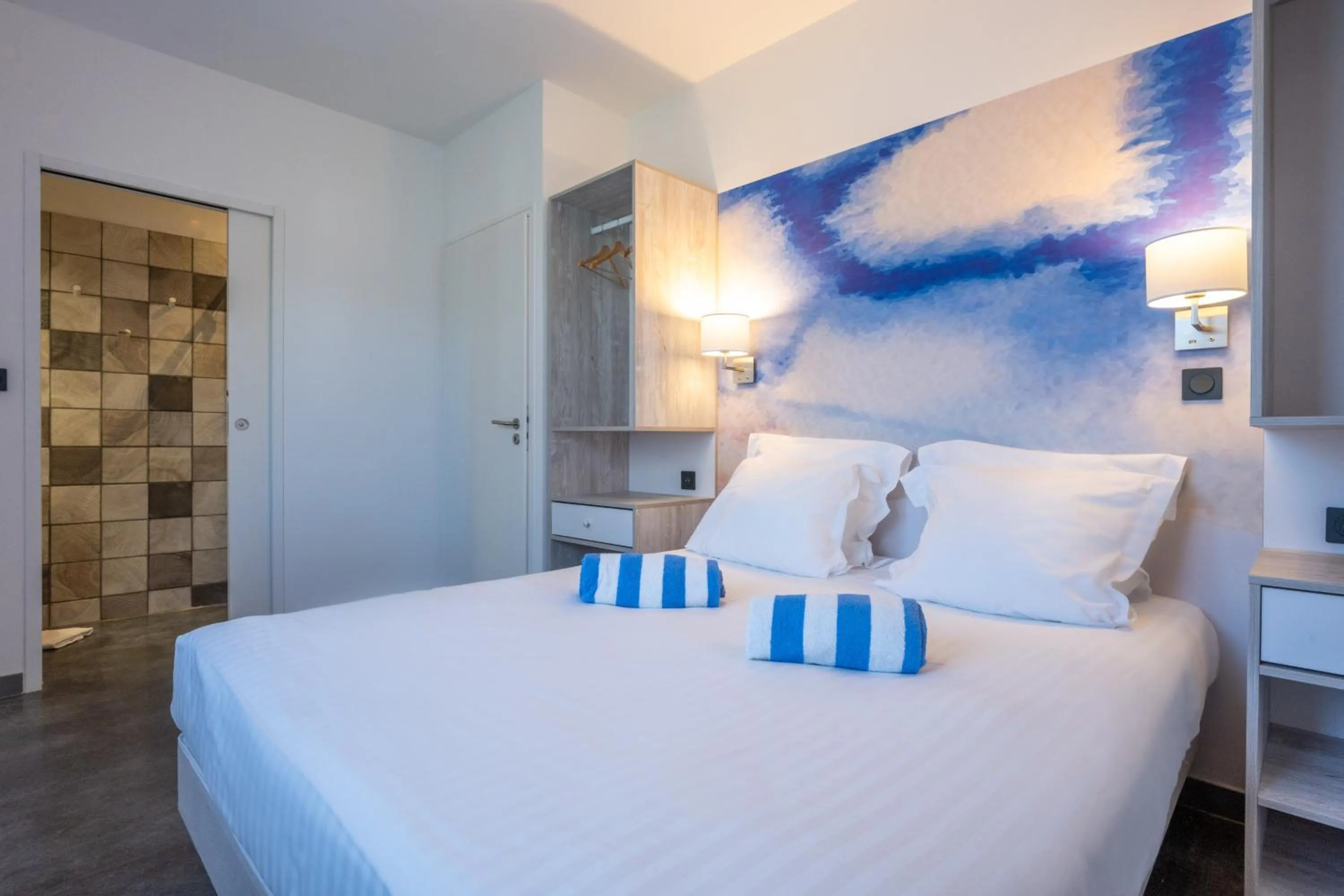 Bed in Côté Océan Resort