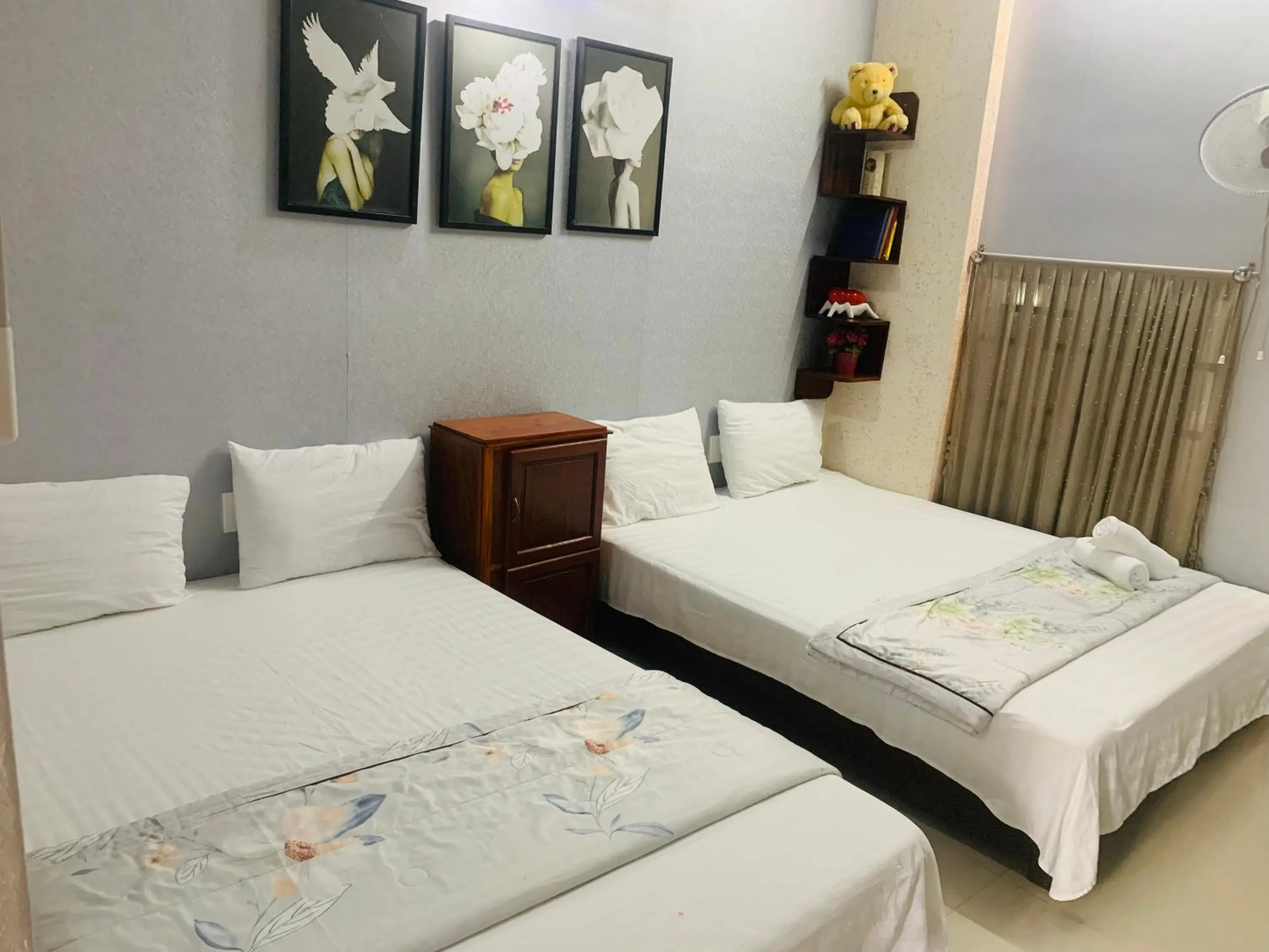 Bed in Kota's House Homestay