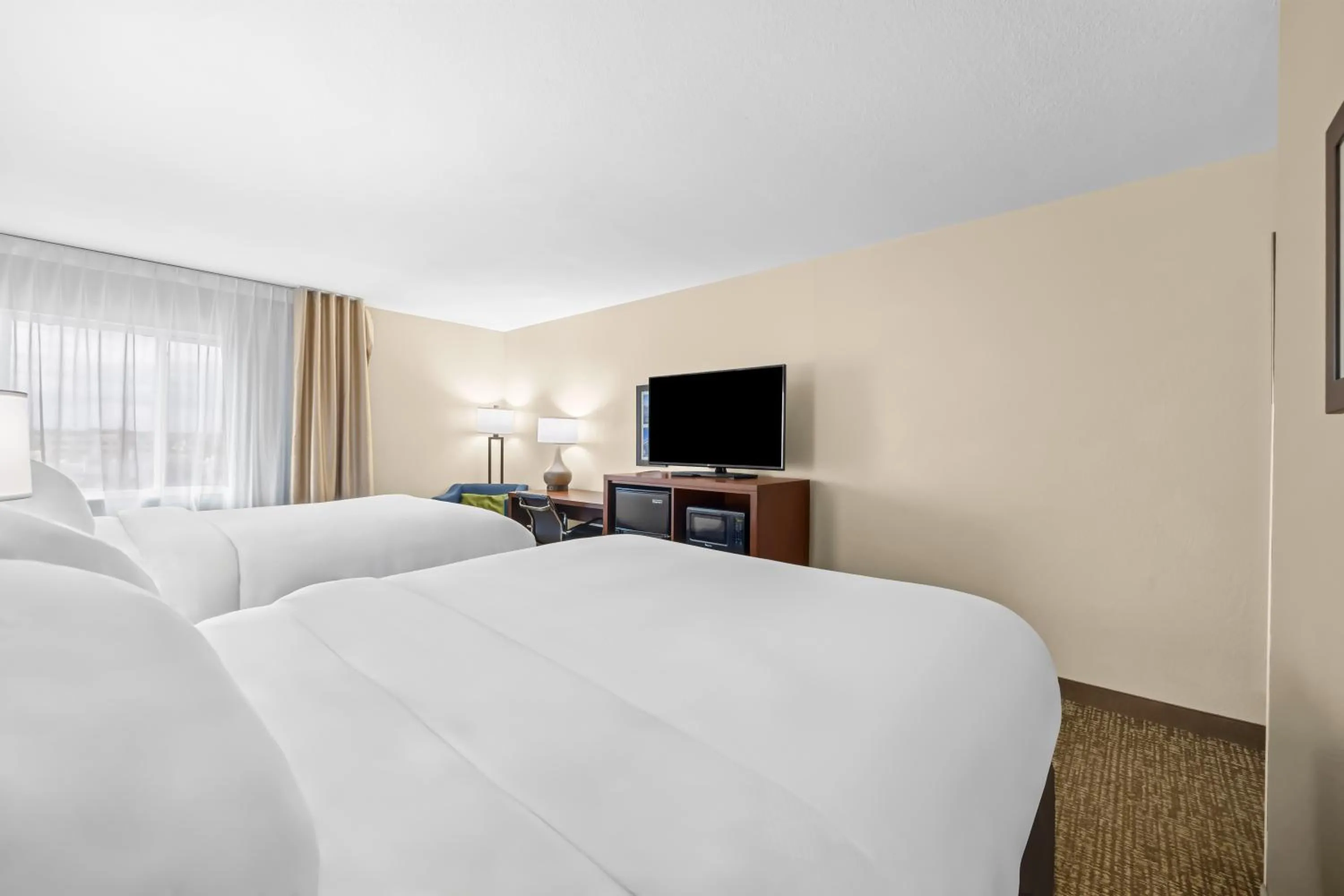 Photo of the whole room, Bed in Comfort Inn & Suites Pueblo