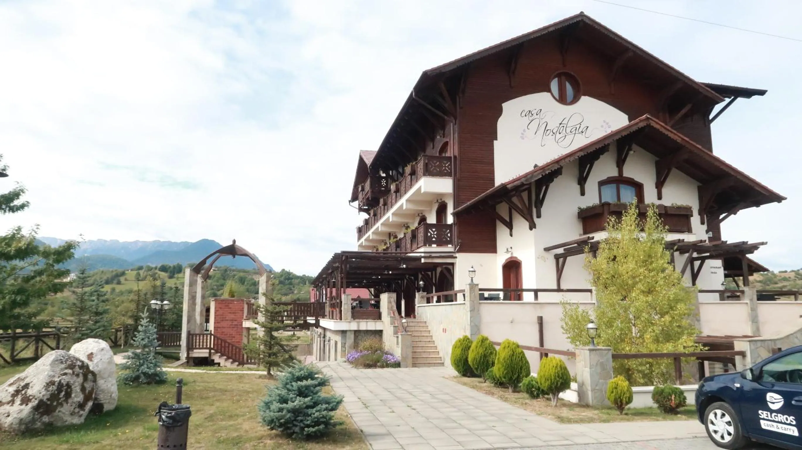 Property logo or sign in Pensiunea Casa Nostalgia