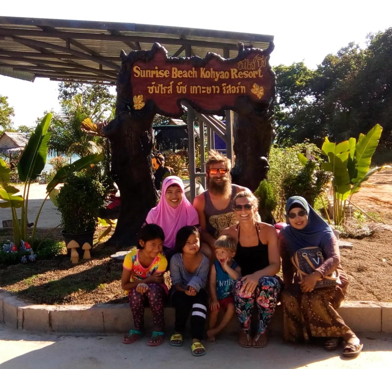 Family in Sunrise Beach Kohyao Resort