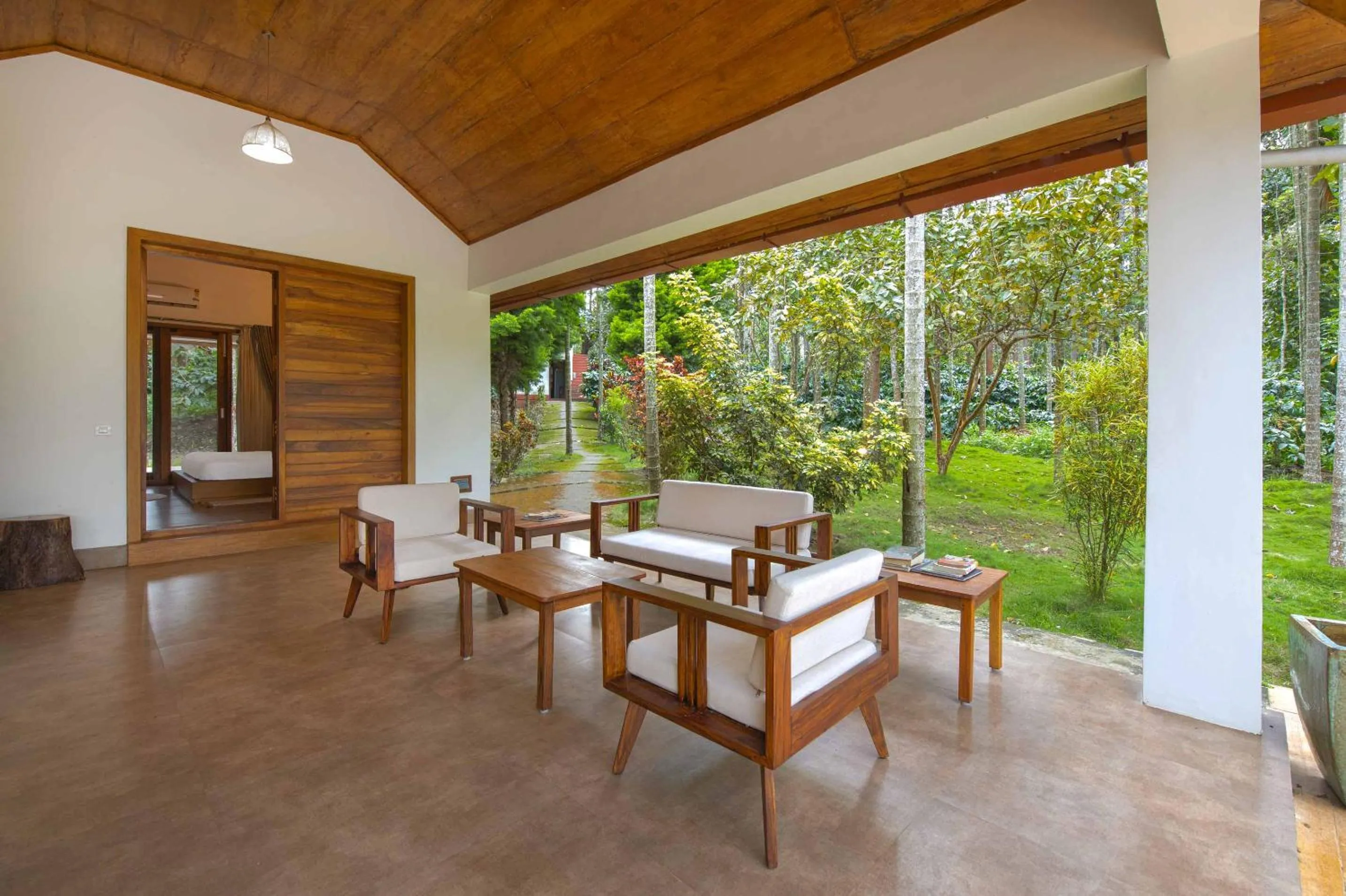 Living room in StayVista at Tall Silver with Infinity Pool & Breakfast -2BR