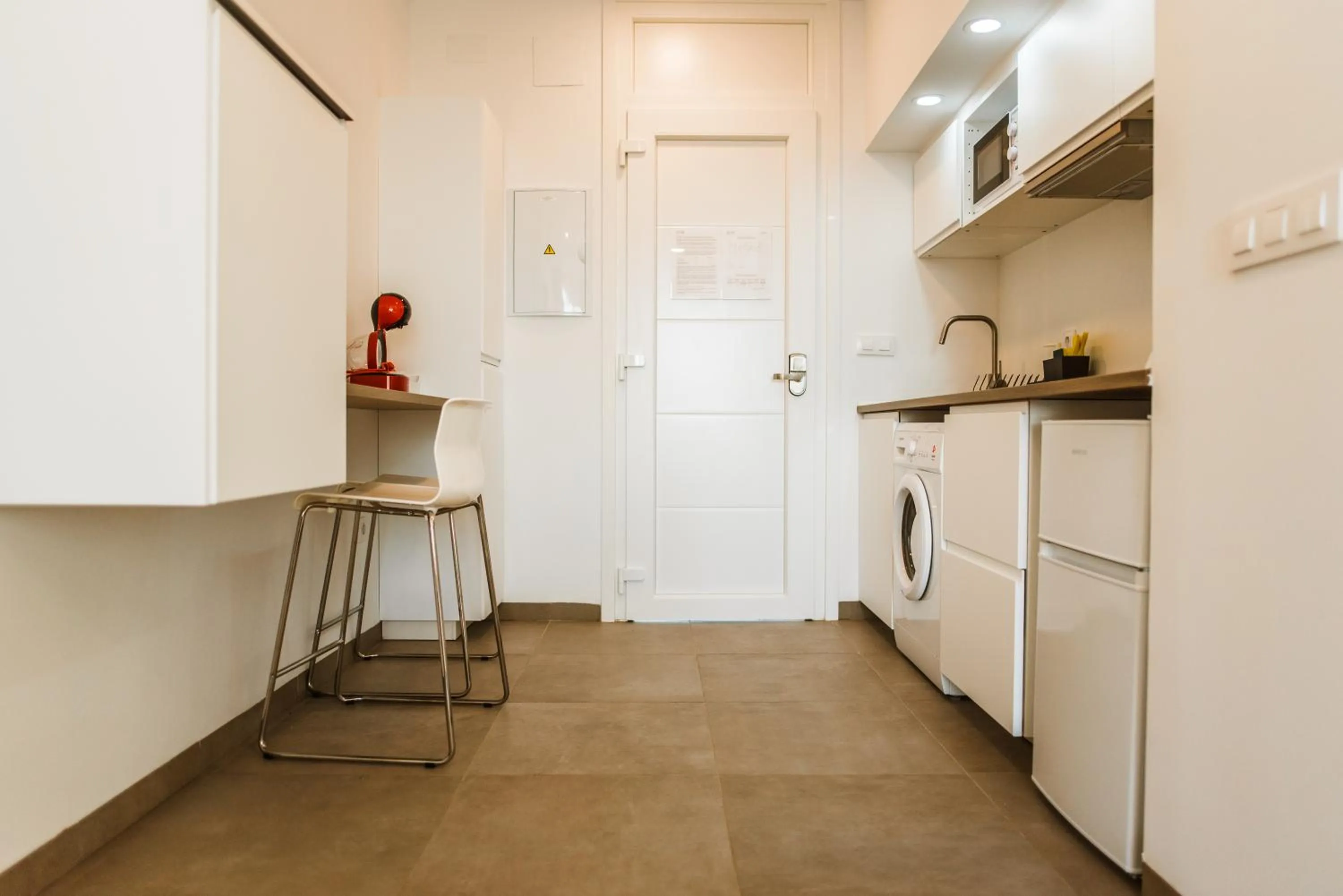 Kitchen or kitchenette in Apartamentos ZHR