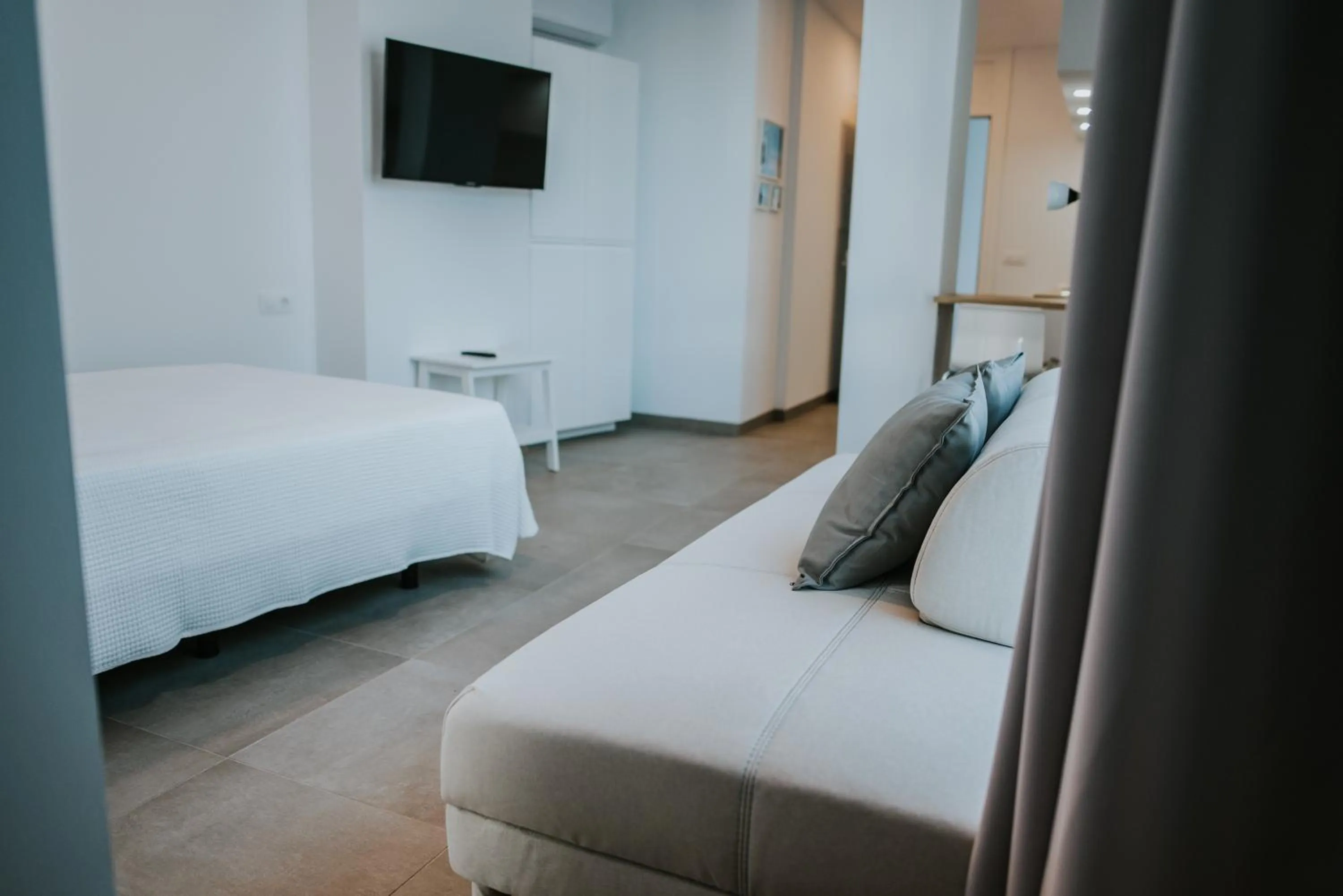 Living room, Bed in Apartamentos ZHR