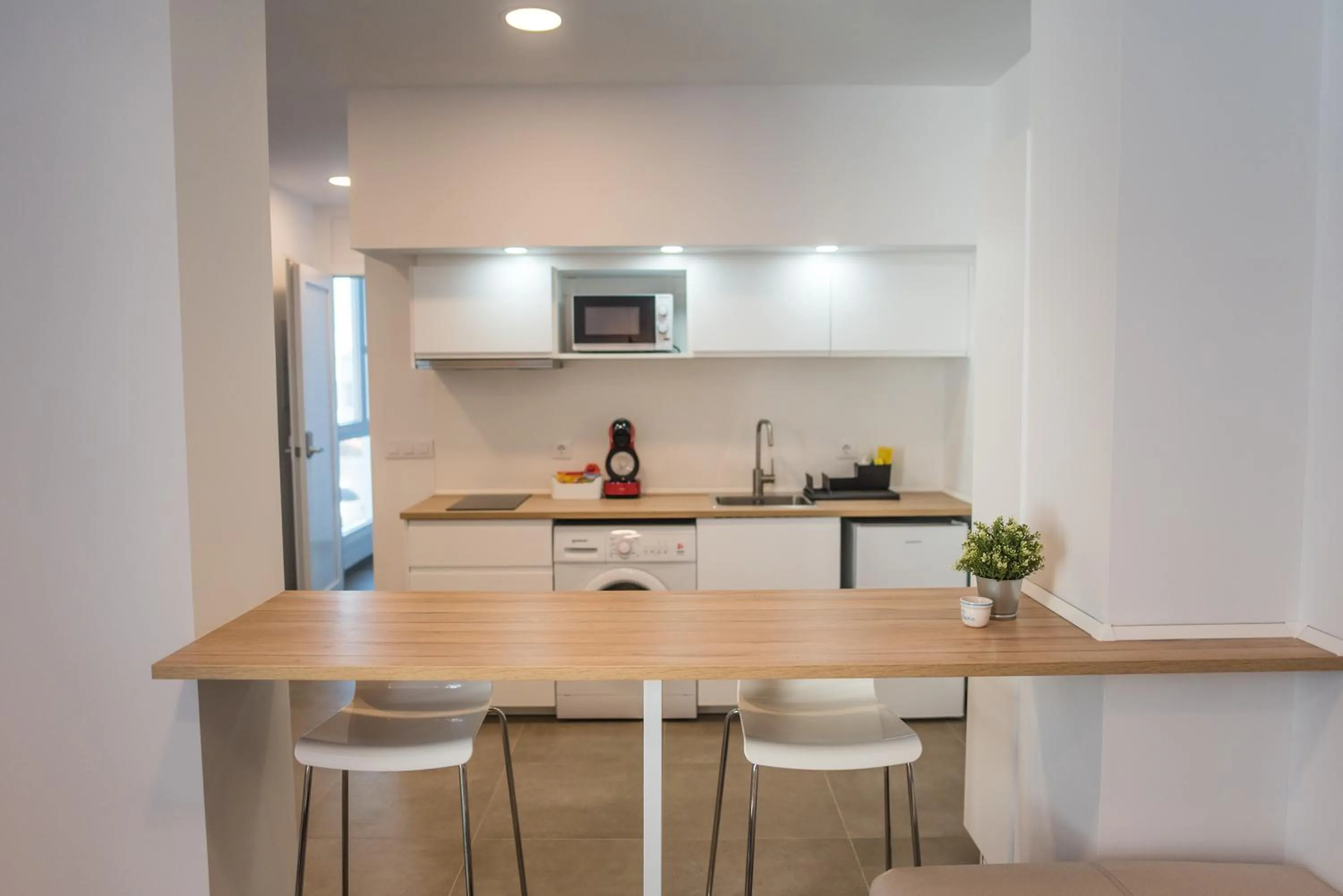 Kitchen or kitchenette in Apartamentos ZHR