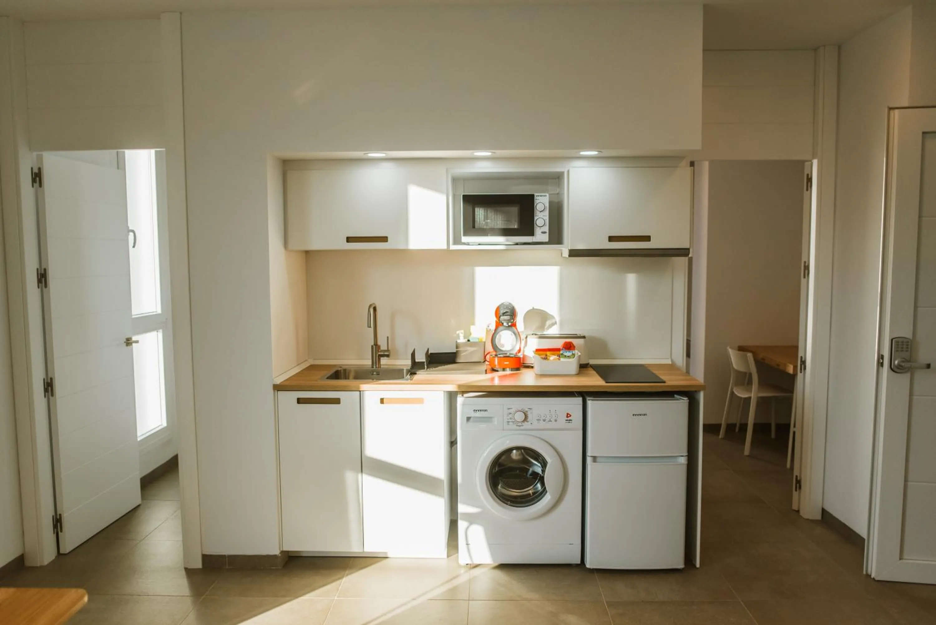 Kitchen or kitchenette in Apartamentos ZHR