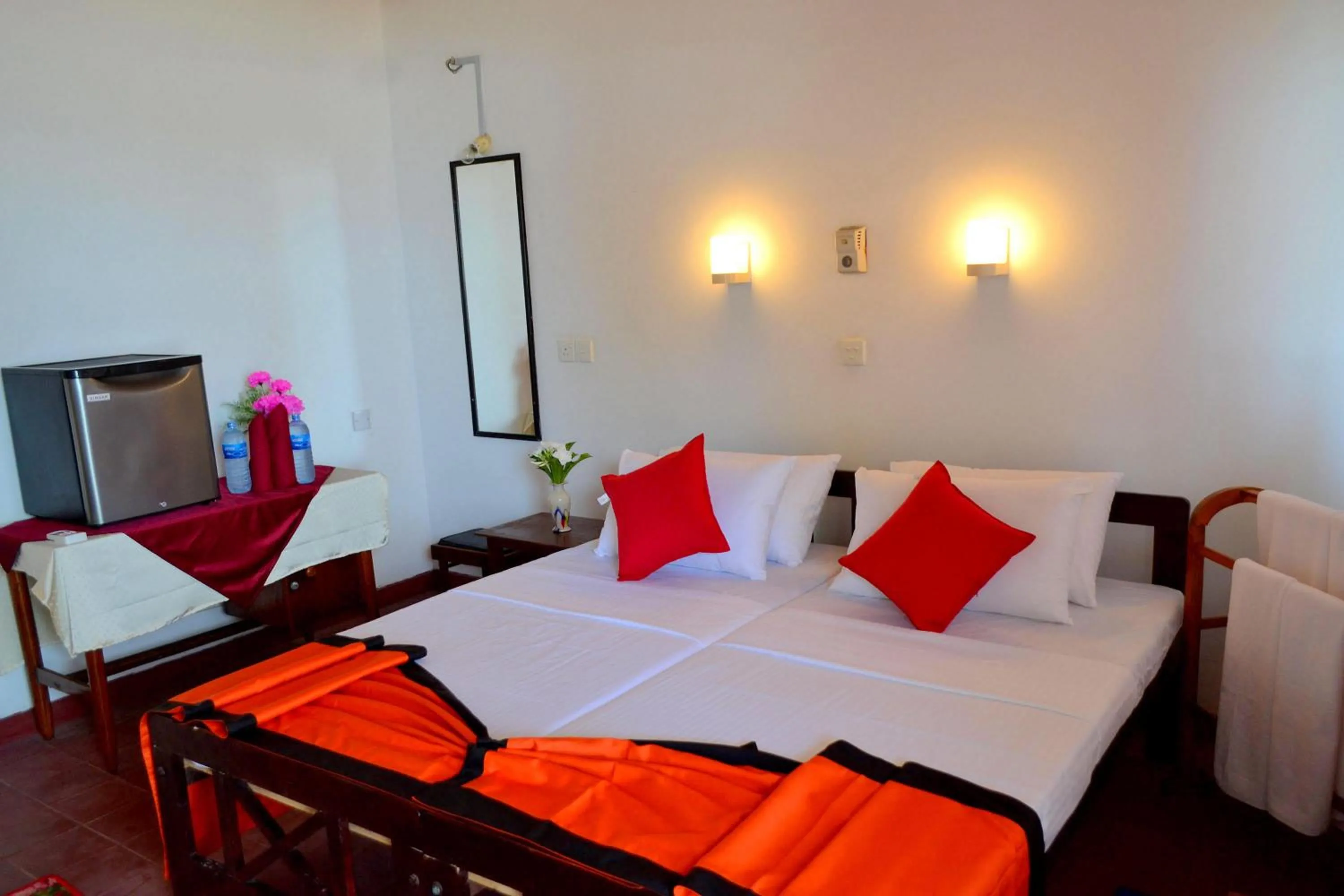 Bed in New SeaSide Inn Hikkaduwa