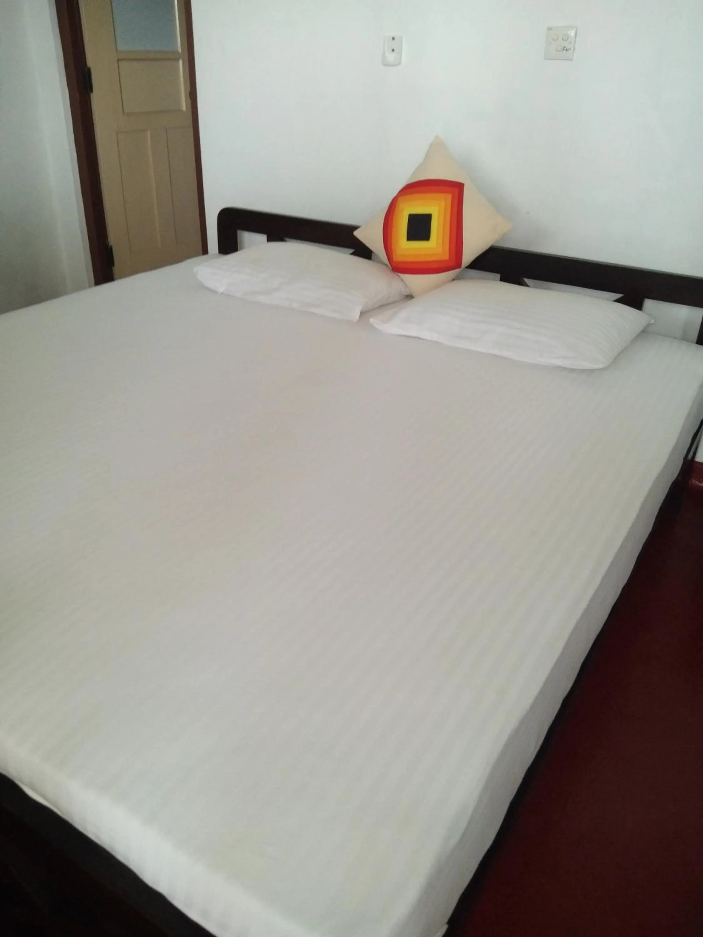 Bed in New SeaSide Inn Hikkaduwa