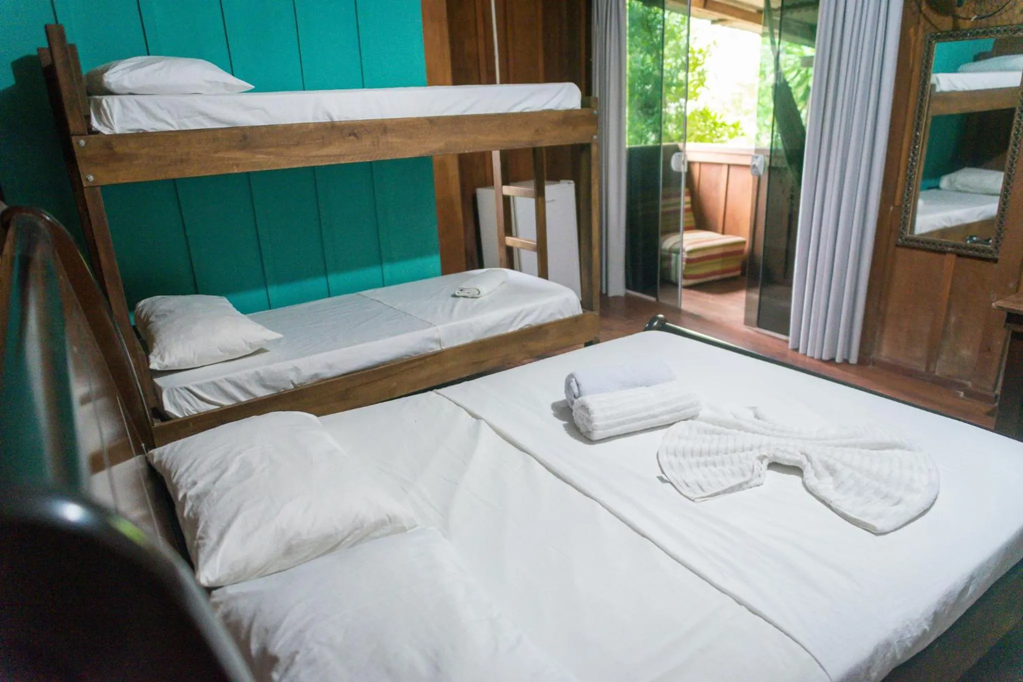 Bed in Pousada Recanto Tropical