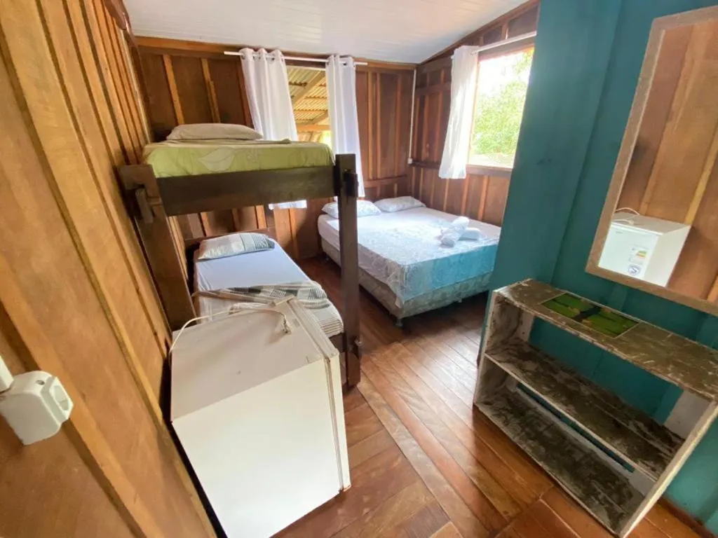 Bed in Pousada Recanto Tropical