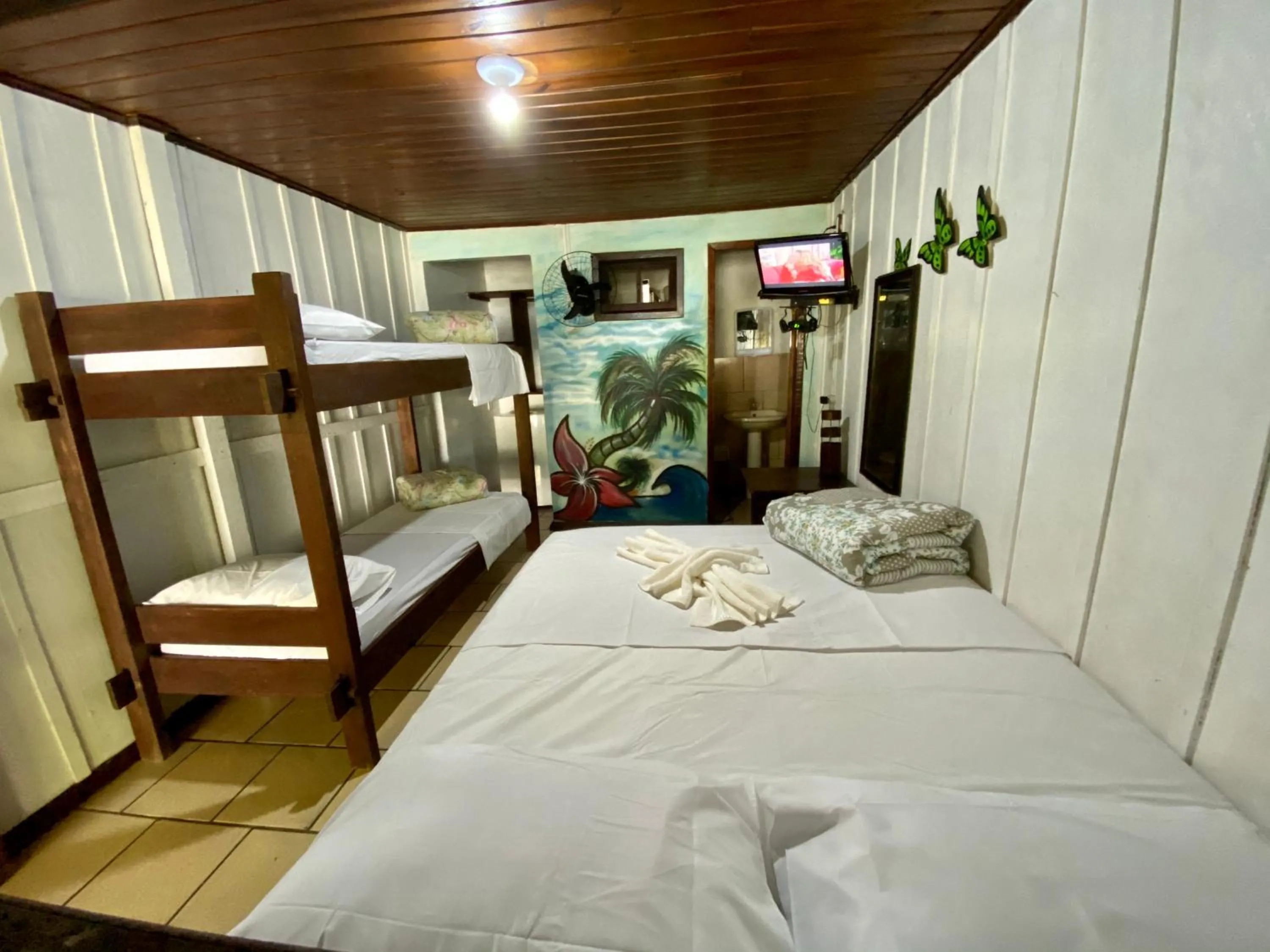 Bed in Pousada Recanto Tropical