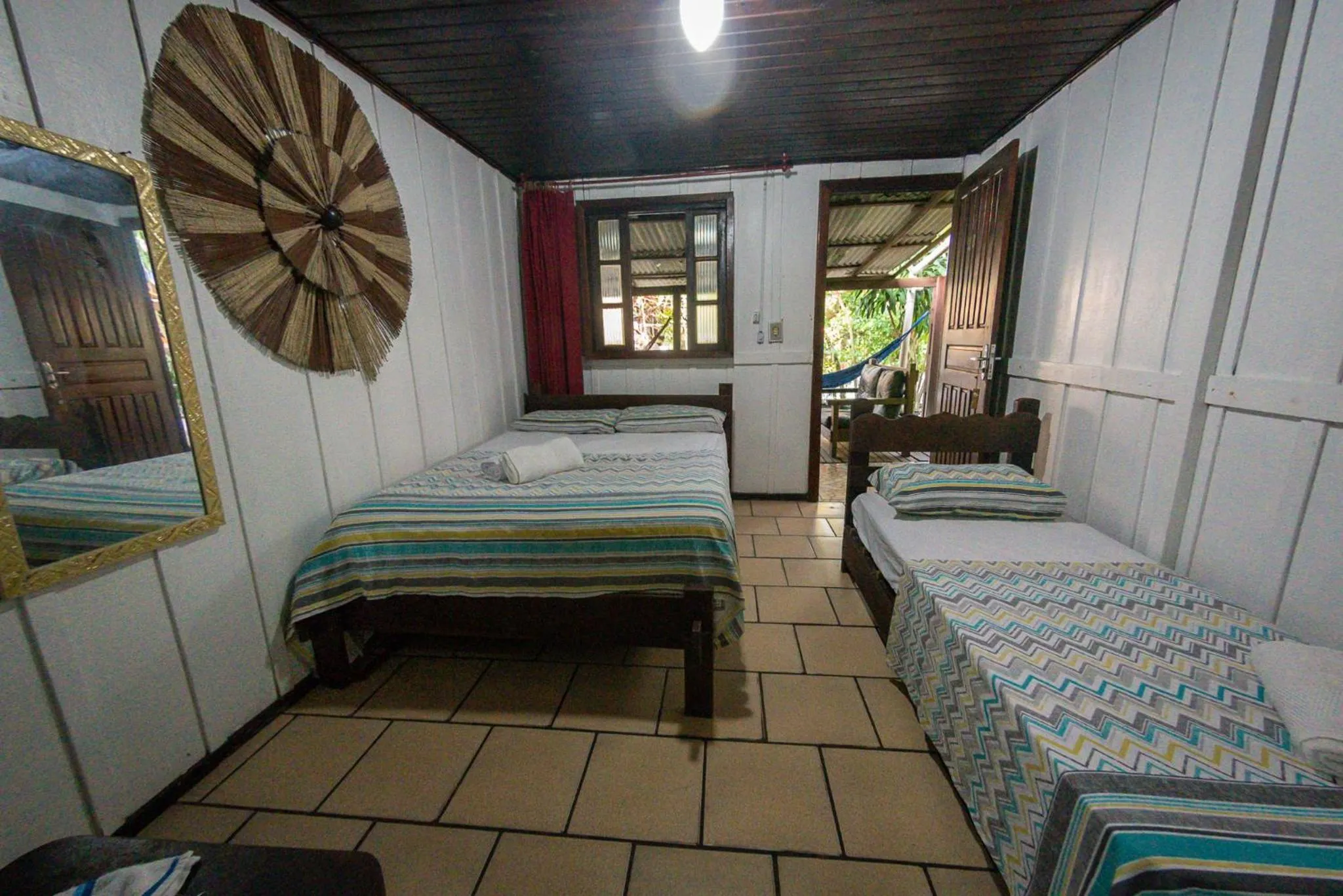 Bed in Pousada Recanto Tropical