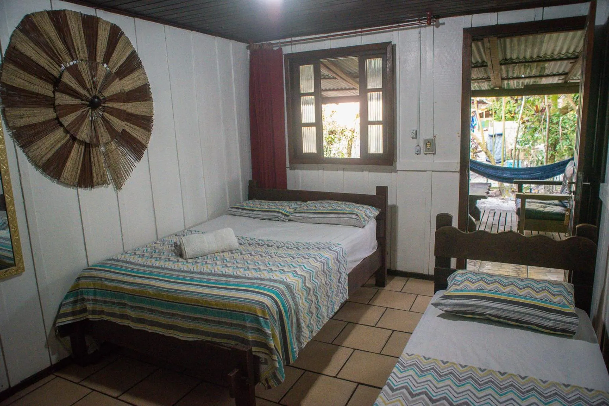 Bed in Pousada Recanto Tropical