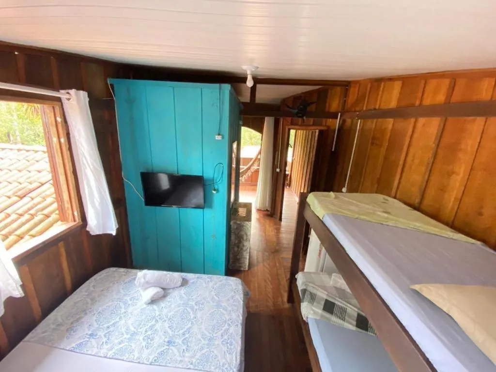 Bed in Pousada Recanto Tropical