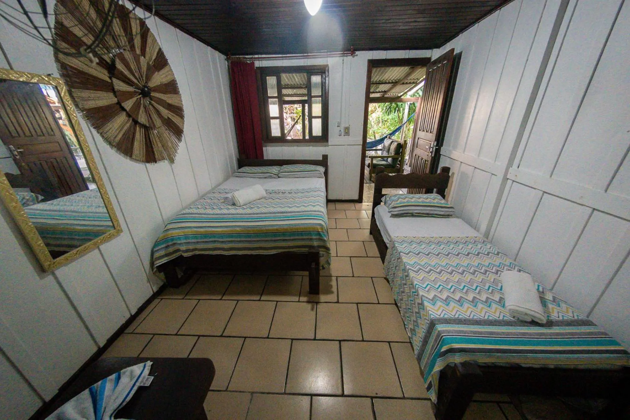 Bed in Pousada Recanto Tropical