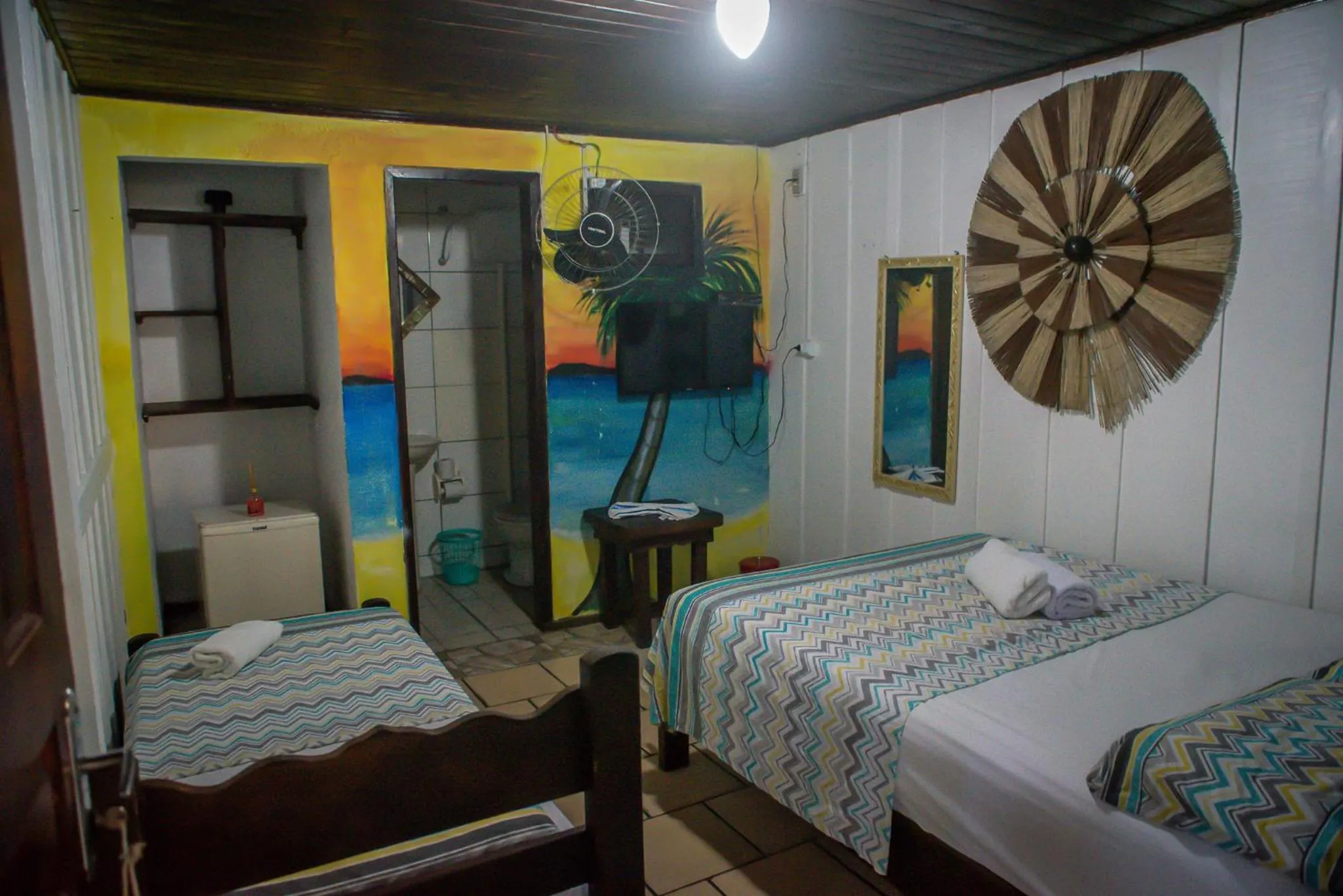 Bed in Pousada Recanto Tropical