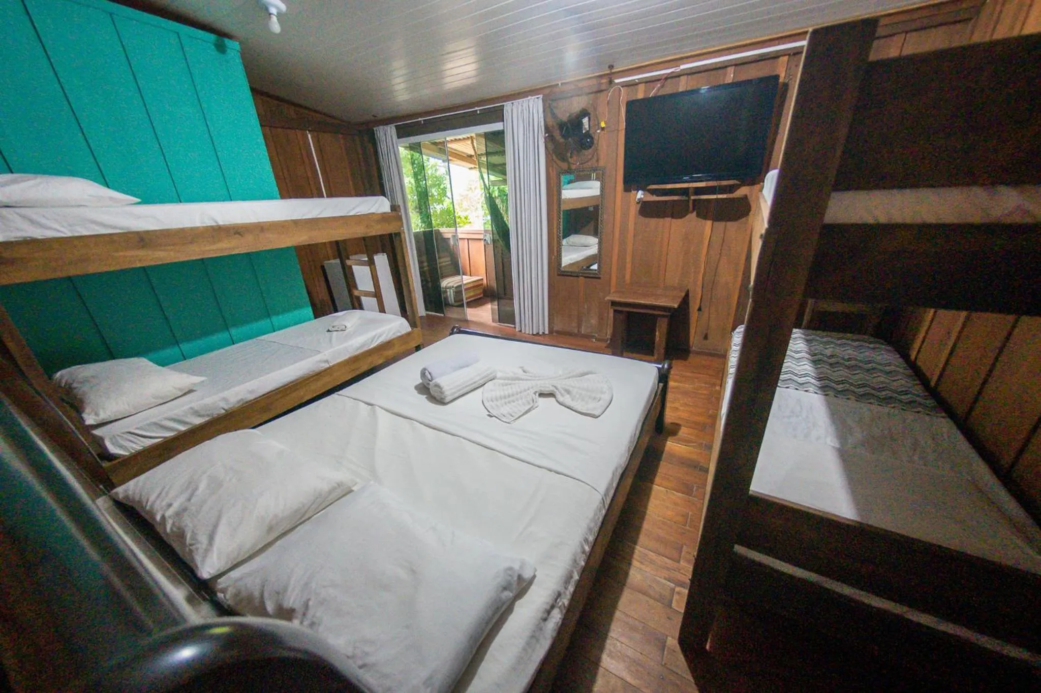 Bed in Pousada Recanto Tropical