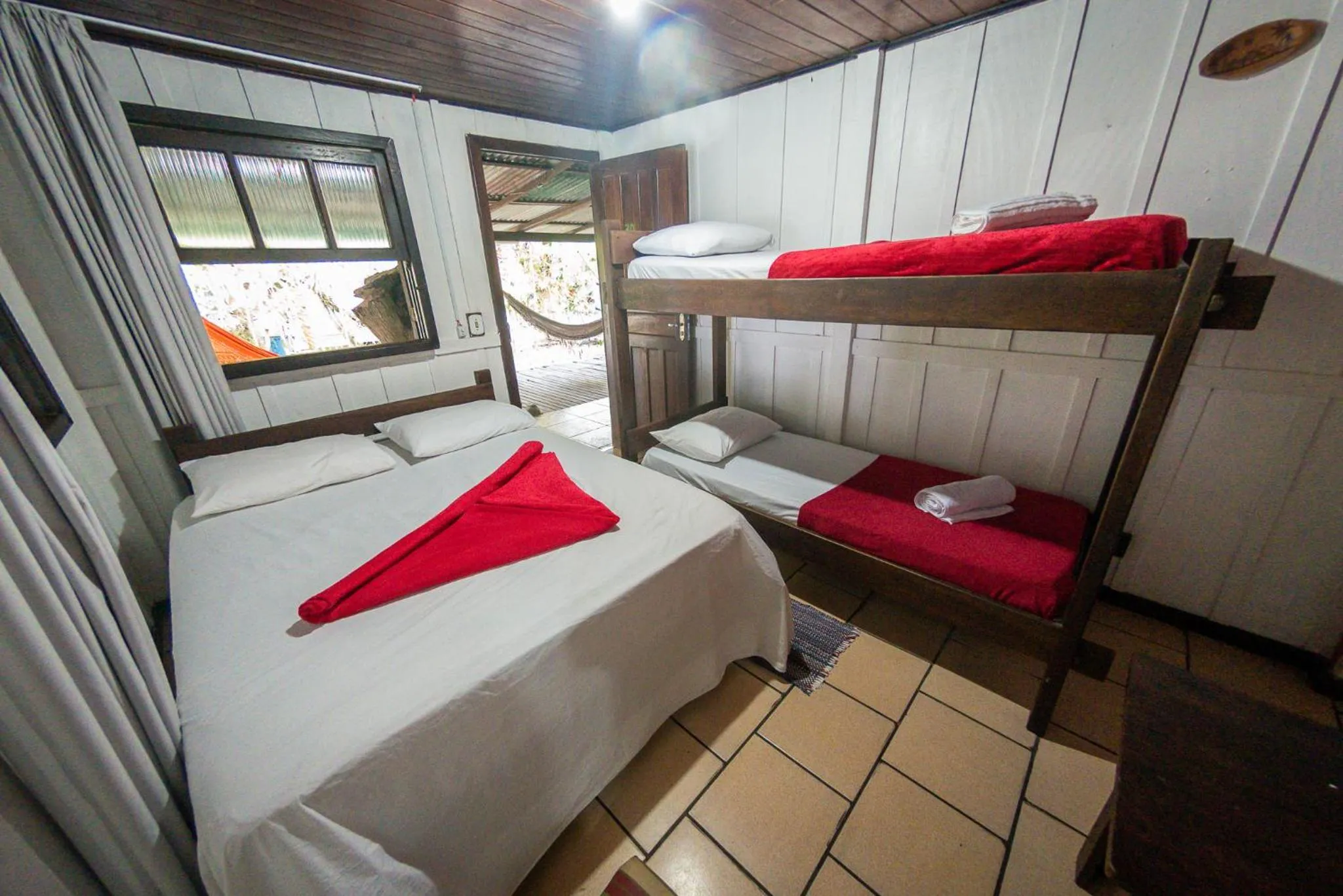 Bed in Pousada Recanto Tropical