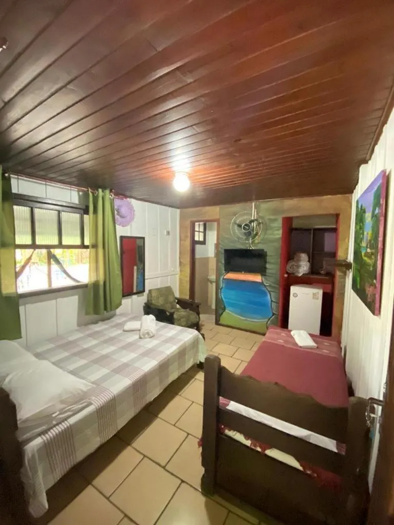 Bed in Pousada Recanto Tropical
