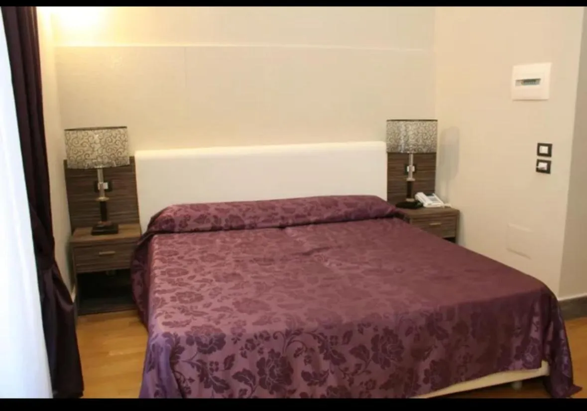 Bed in Hotel Villa La Colombaia