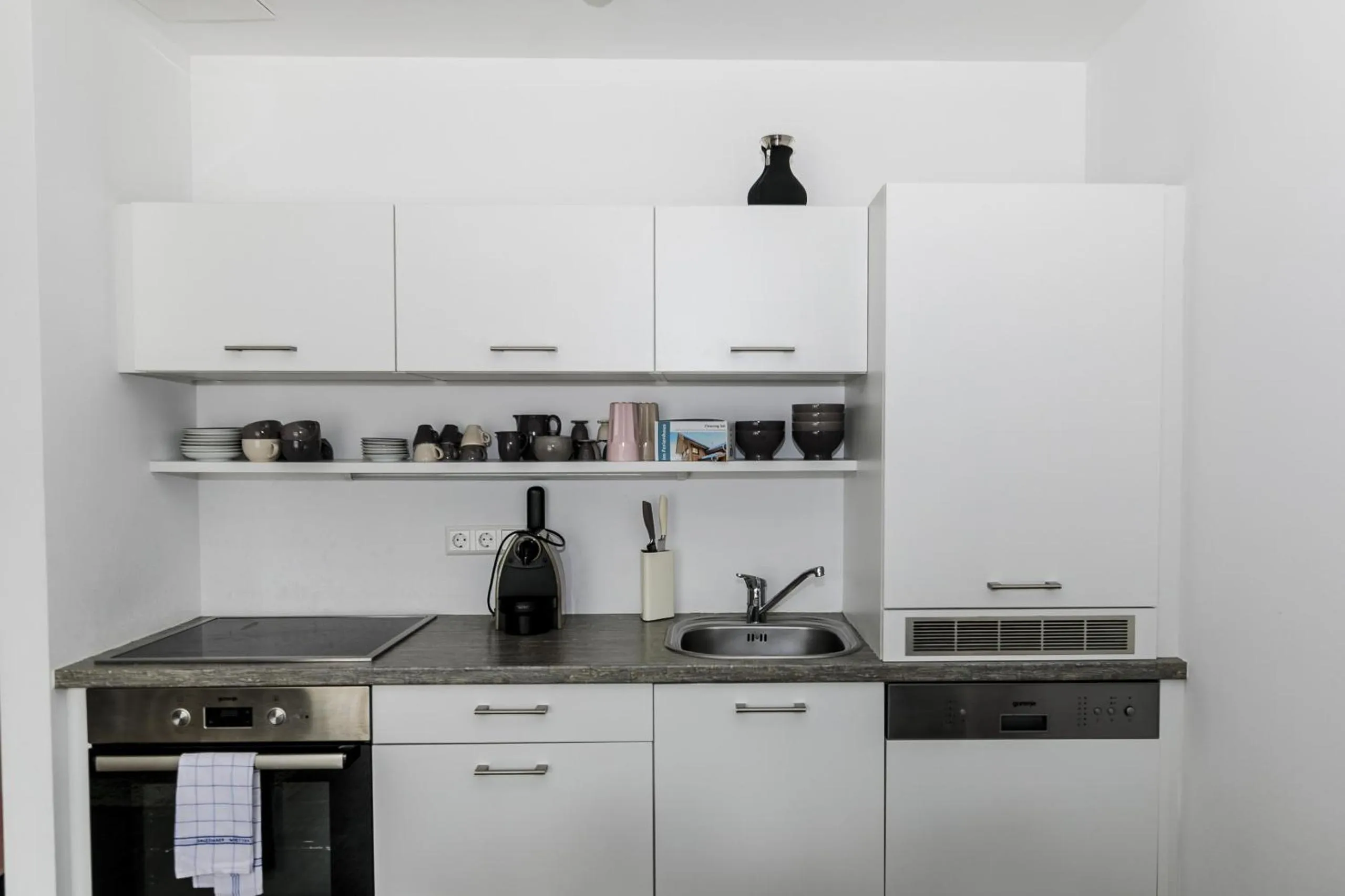 Kitchen or kitchenette in Alpenrock Schladming by ALPS RESORTS