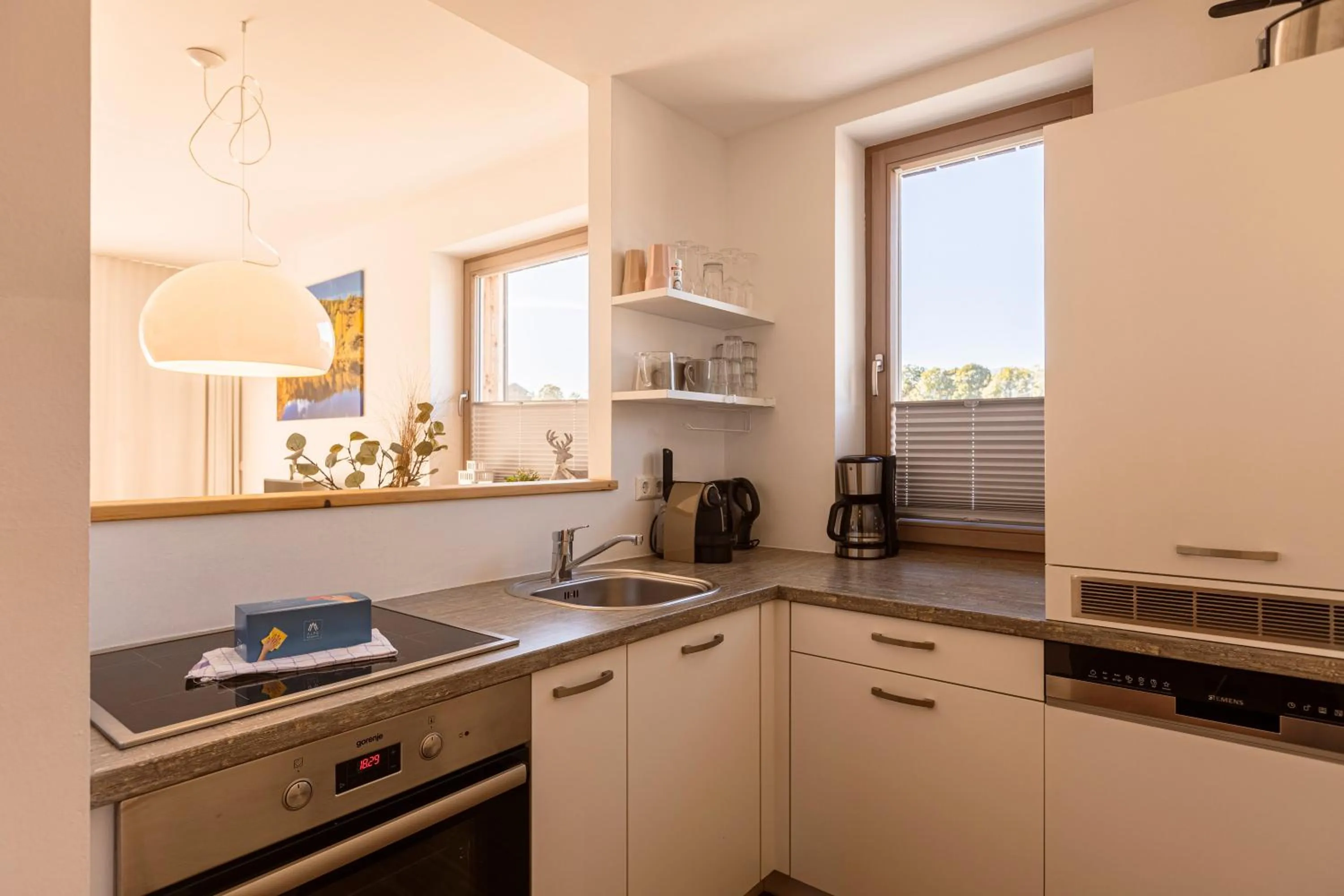 Kitchen or kitchenette in Alpenrock Schladming by ALPS RESORTS