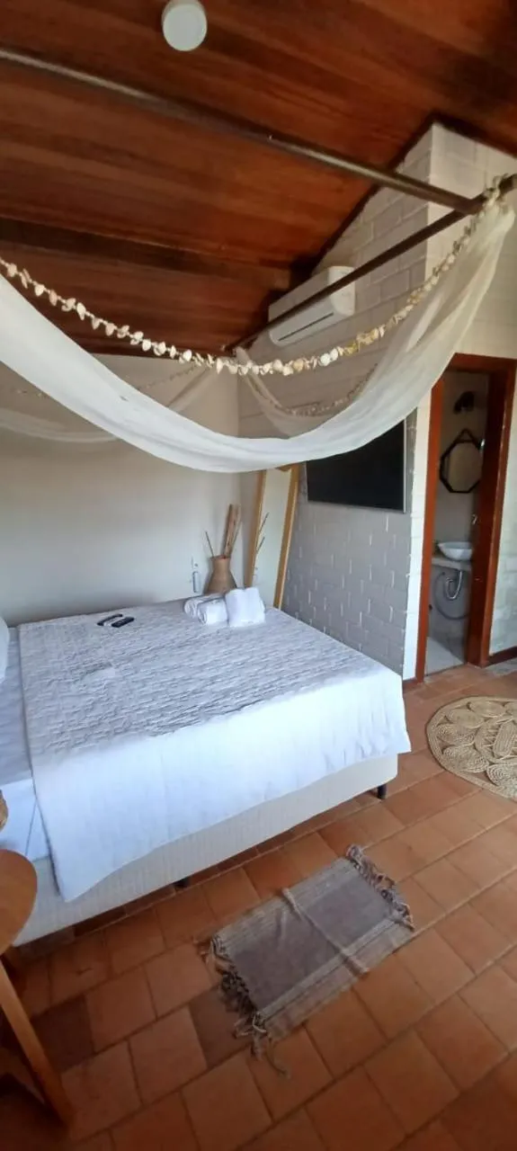 Bed in Pousada Ares de Noronha
