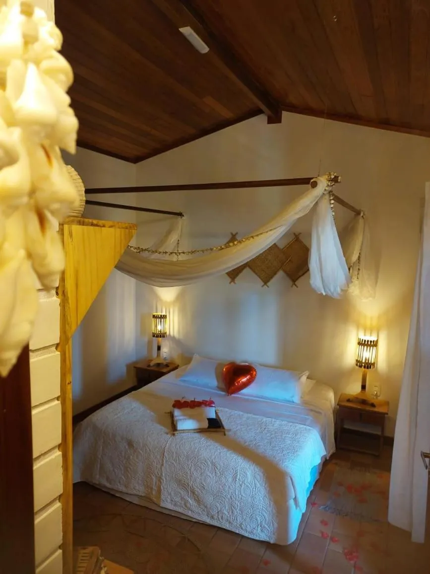 Bed in Pousada Ares de Noronha