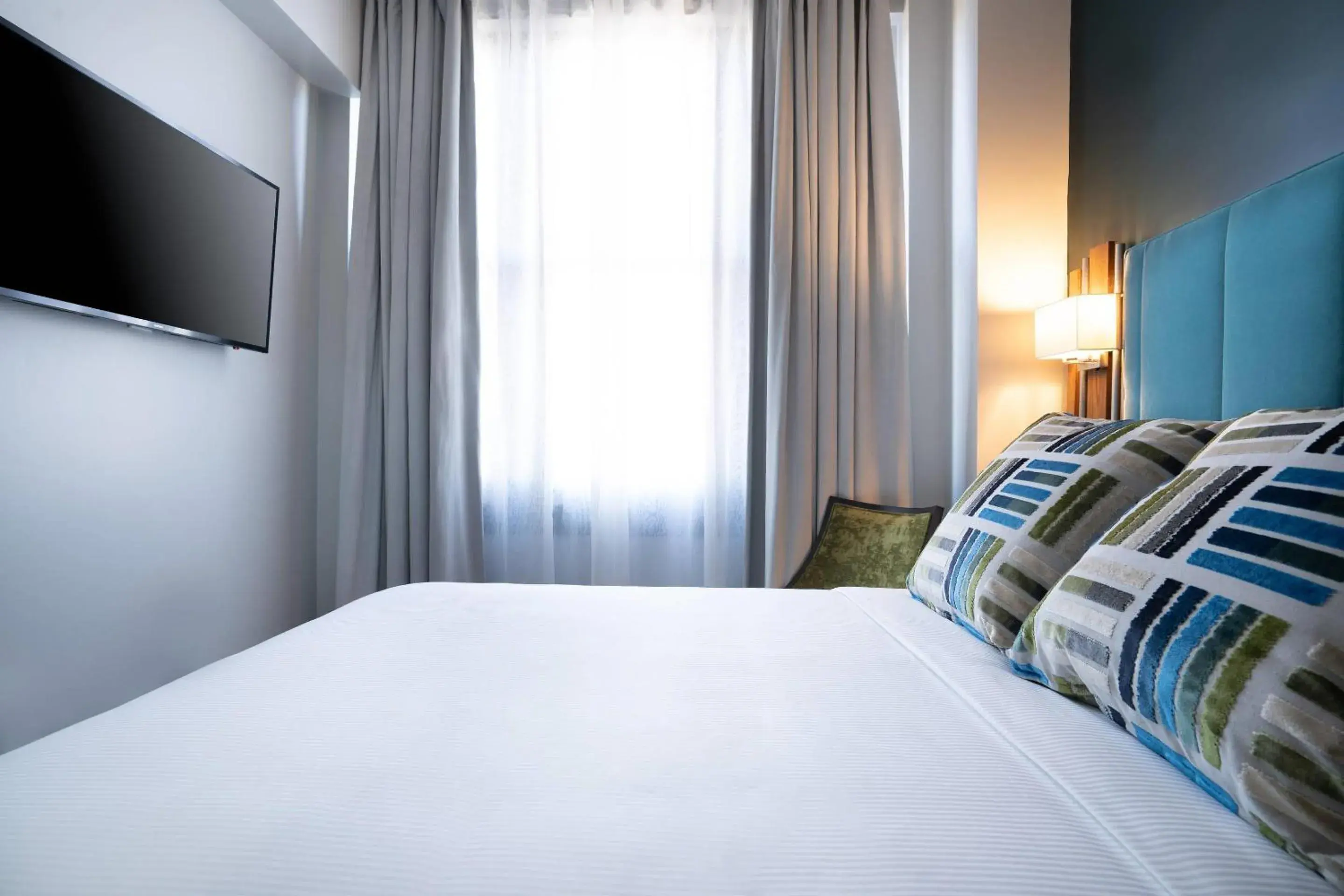 Bedroom, Bed in The Esquire Hotel Downtown Gastonia, an Ascend Collection Hotel Bedroom, Bed in The Esquire Hotel Downtown Gastonia, an Ascend Collection Hotel