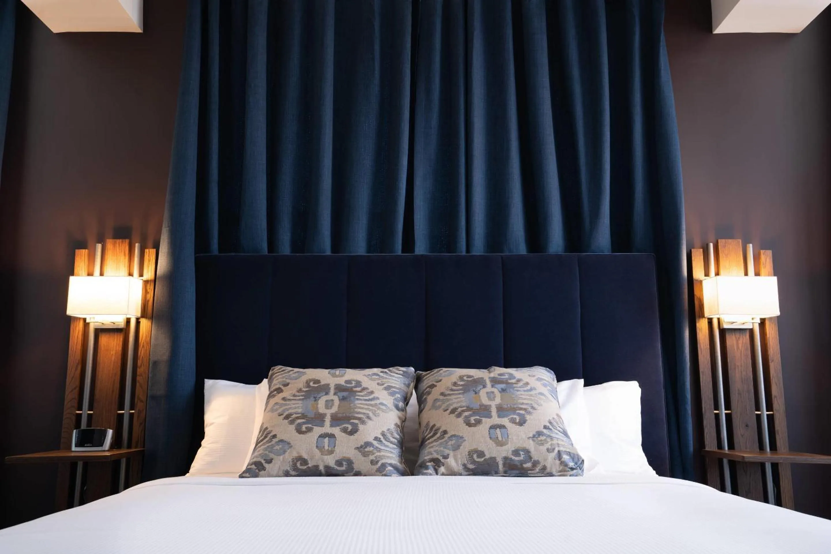 Bedroom, Bed in The Esquire Hotel Downtown Gastonia, an Ascend Collection Hotel