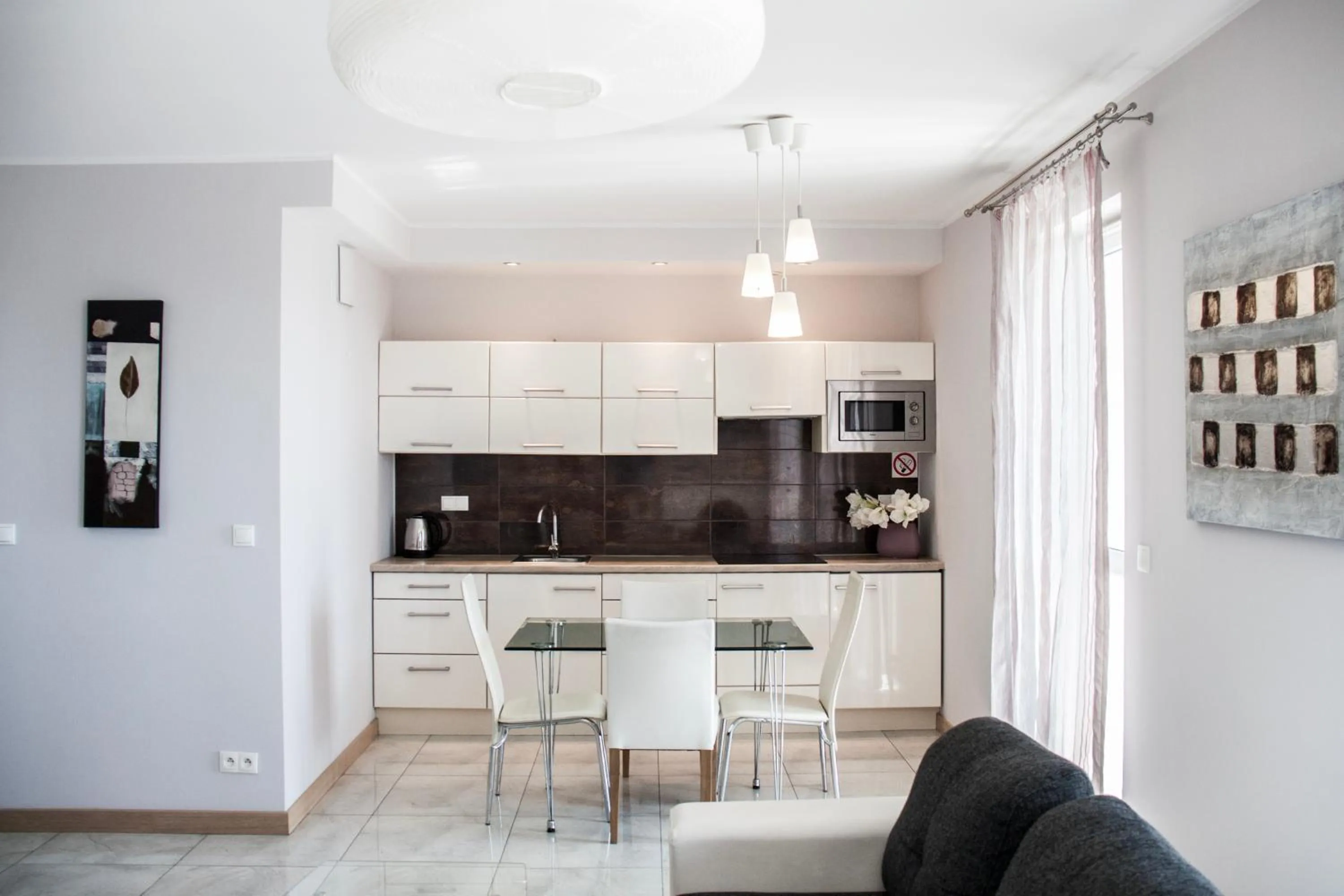 Kitchen or kitchenette in NotaBene Wola Apartment
