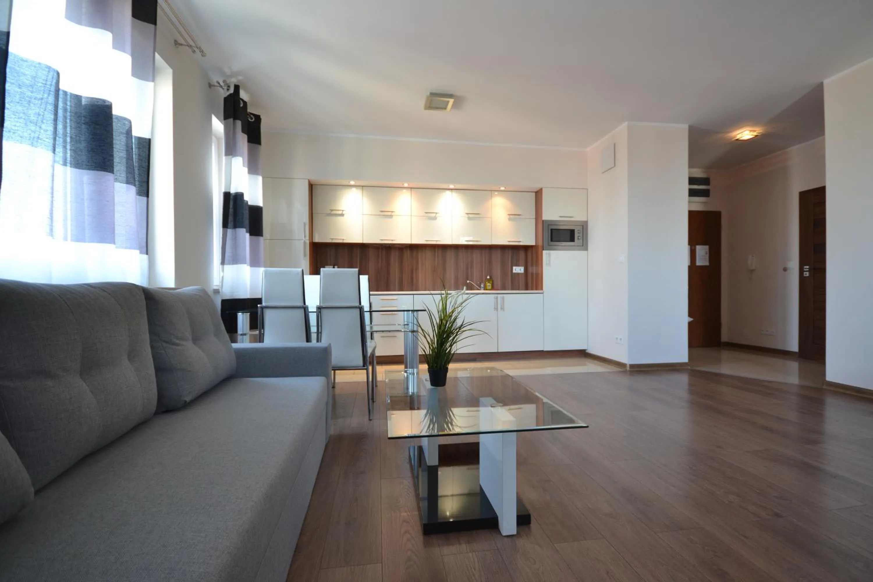 Living room in NotaBene Wola Apartment