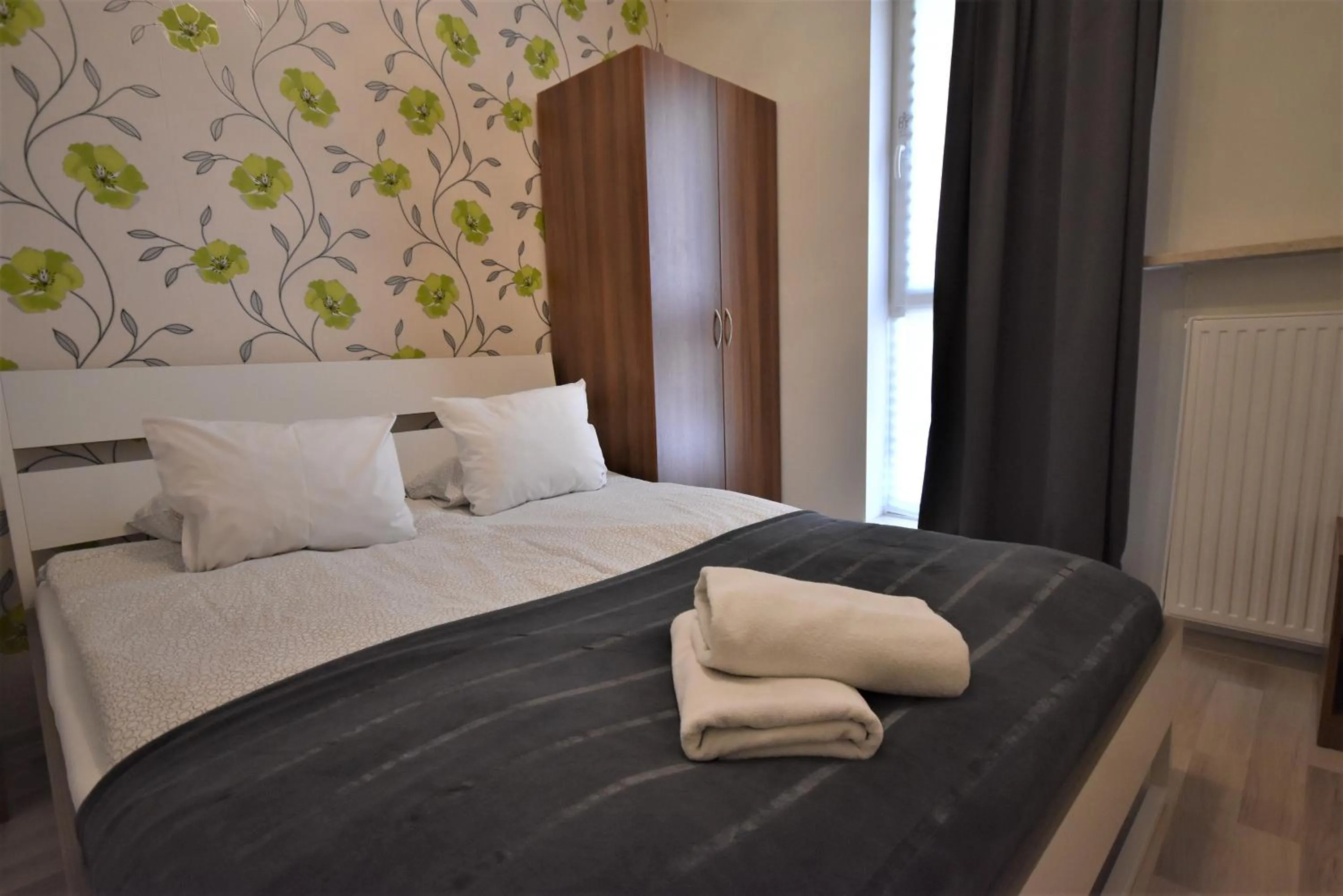 Bed in NotaBene Wola Apartment