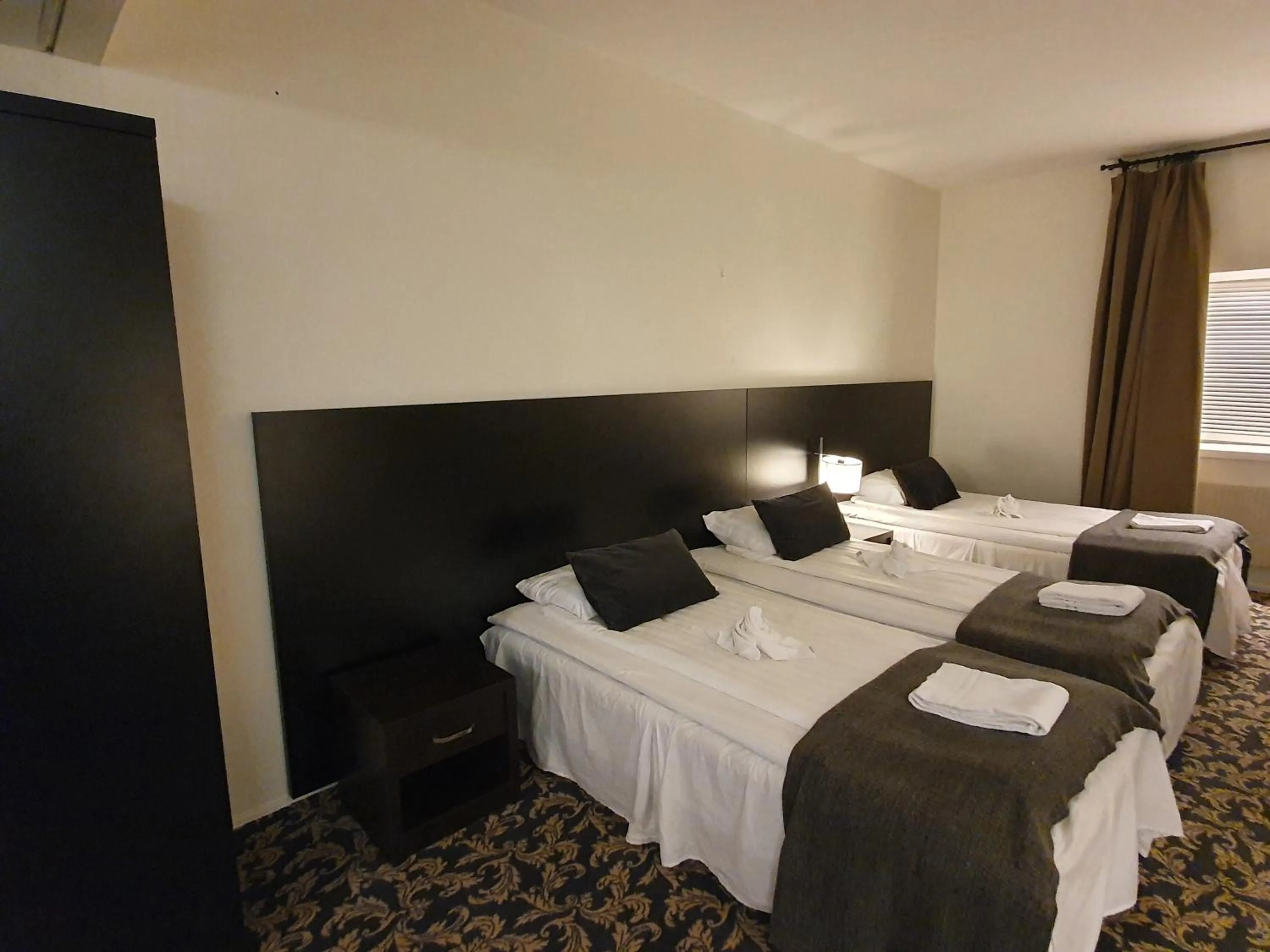Bedroom, Bed in Ariston Hotell