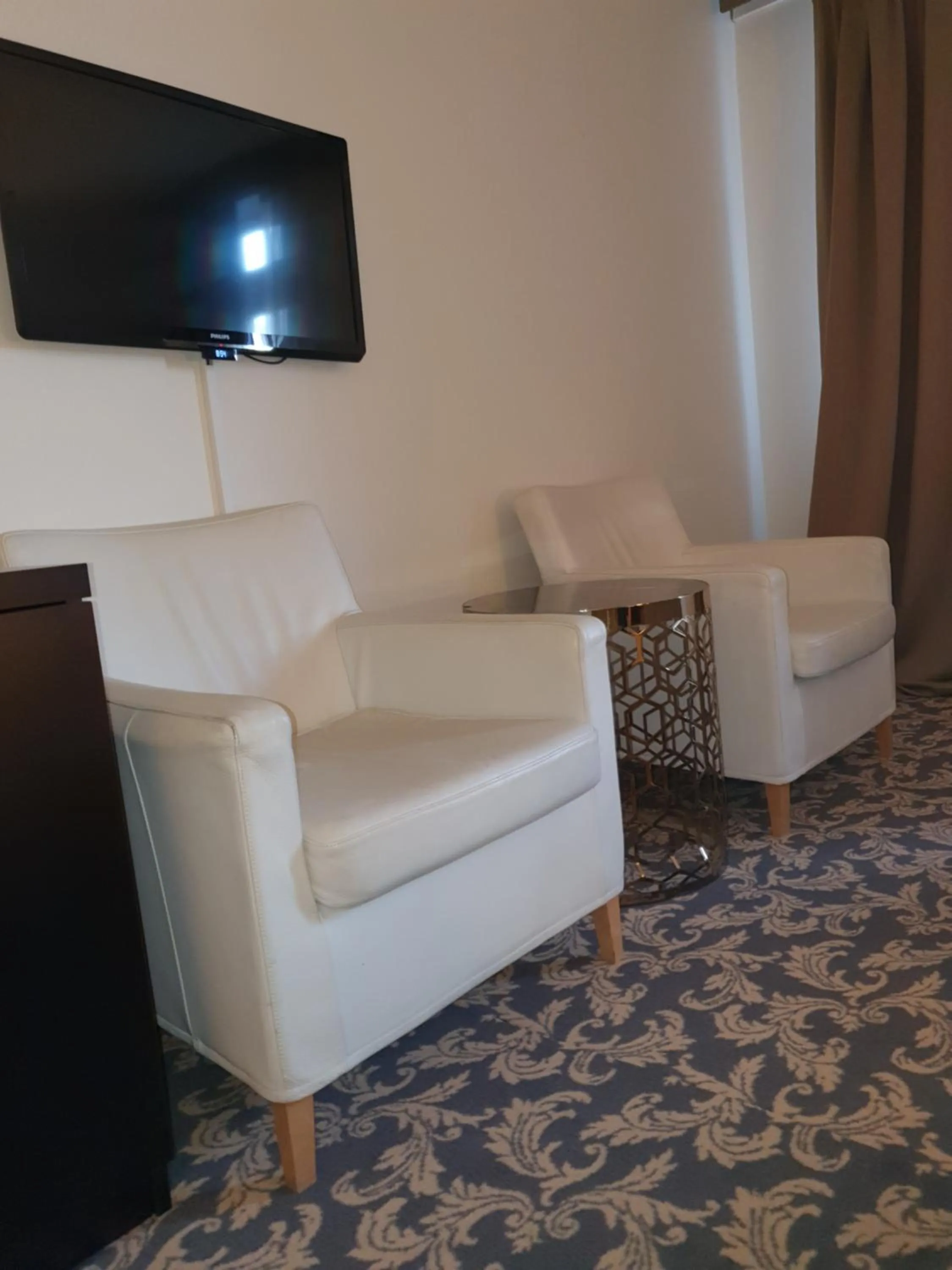 Seating area in Ariston Hotell